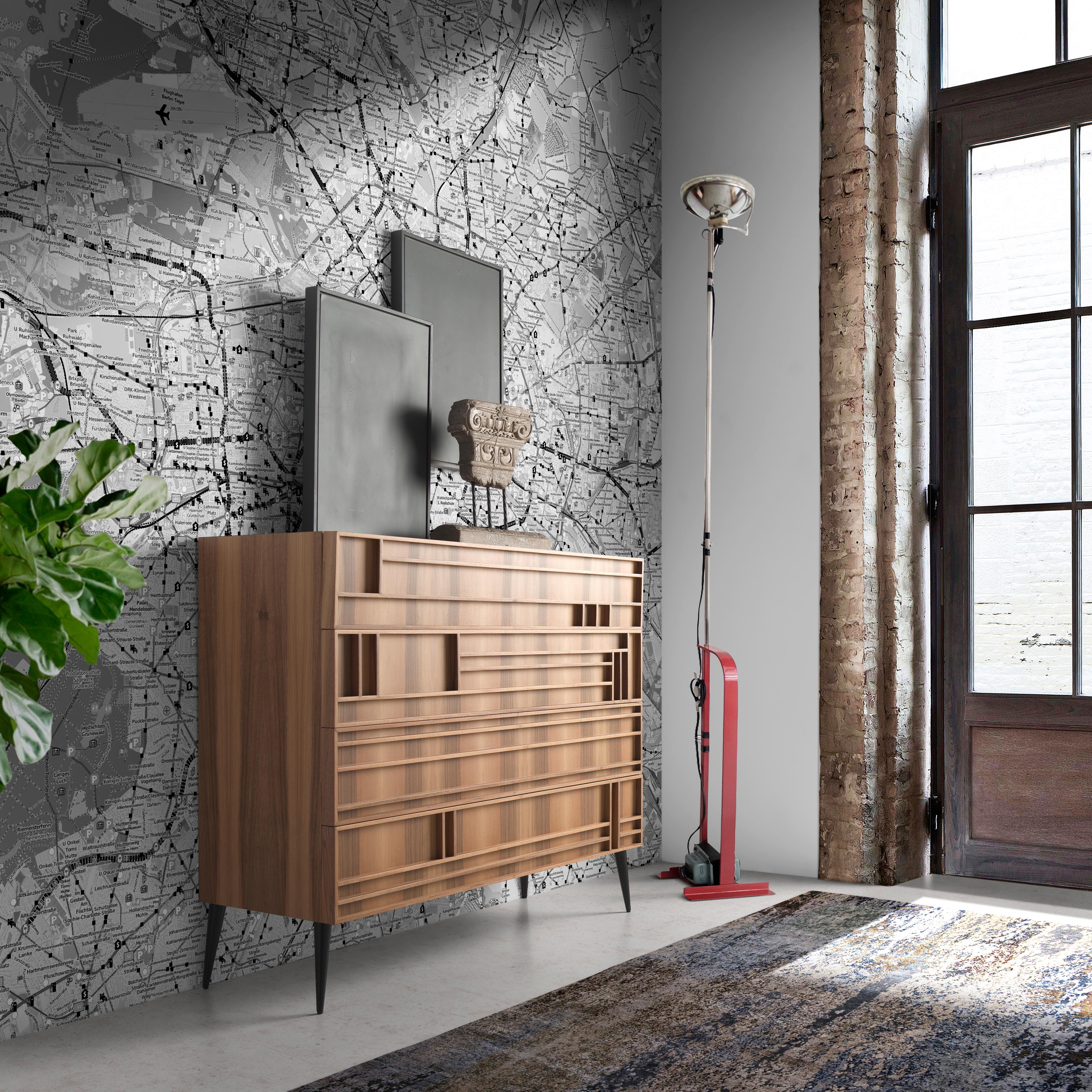 The Phoenix chest stands out for its elegant presence, an impressive combination of functionality and aesthetics that attracts everyone's attention. Offering generous storage space, its four large drawers are adorned with a walnut wood design that