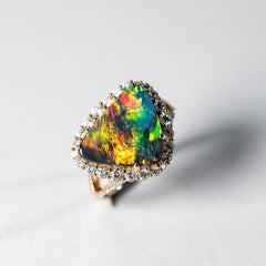 Phoenix Veil - Bague de fiançailles en or 18 carats avec halo de diamant et opale noire certifiée