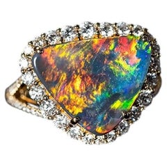 Phoenix Veil - Bague de fiançailles en or 18 carats avec halo de diamant et opale noire certifiée