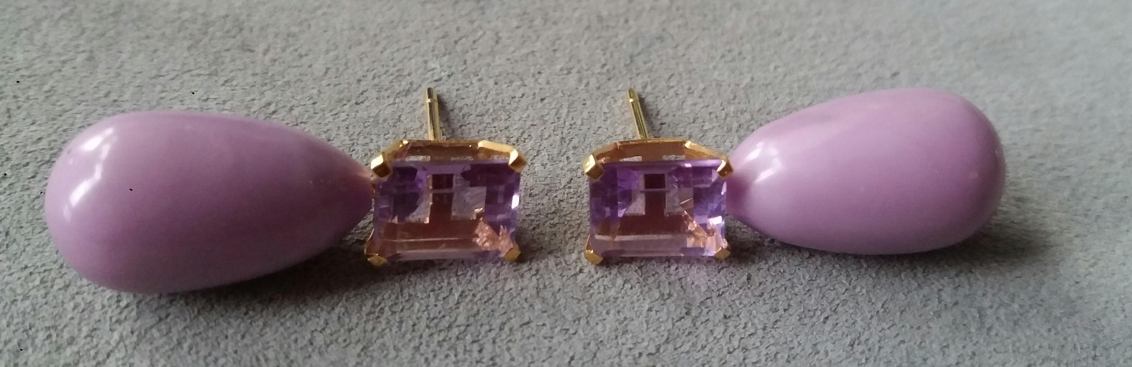 These simple but elegant earrings have 2 faceted rectangular Natural Amethysts set in yellow gold at the top to which are suspended 2  Phosphosiderite round drops size 12 x 22 mm

In 1978 our workshop started in Italy to make simple-chic Art Deco