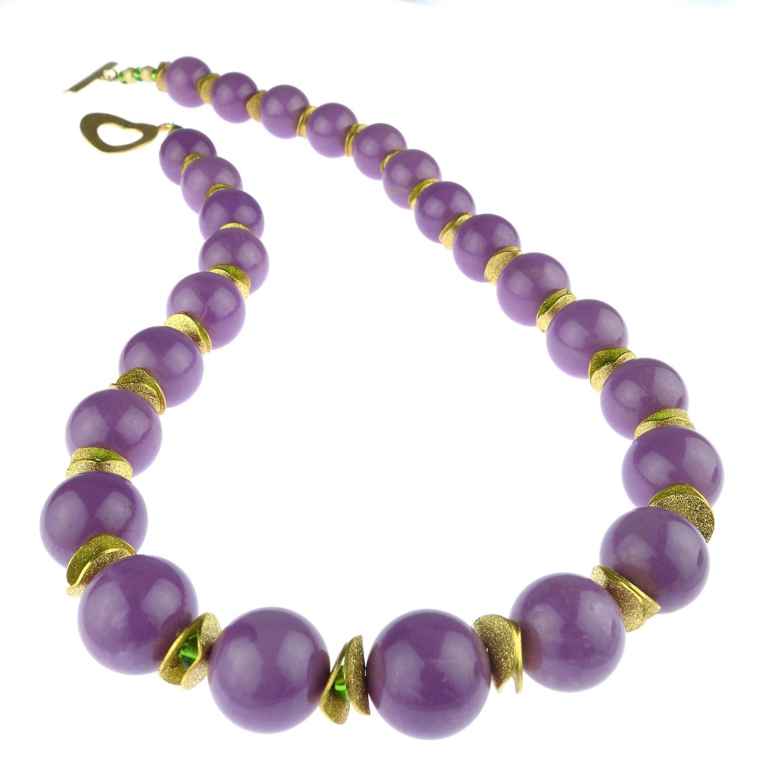 Phosphosiderite, 15 MM spheres of this gorgeous gemstone in a custom made necklace.  These mauvy beads are combined with gold tone flutters and bright green Czech beads in this one of a kind necklace.  This unique 23.5 inch necklace is finished with