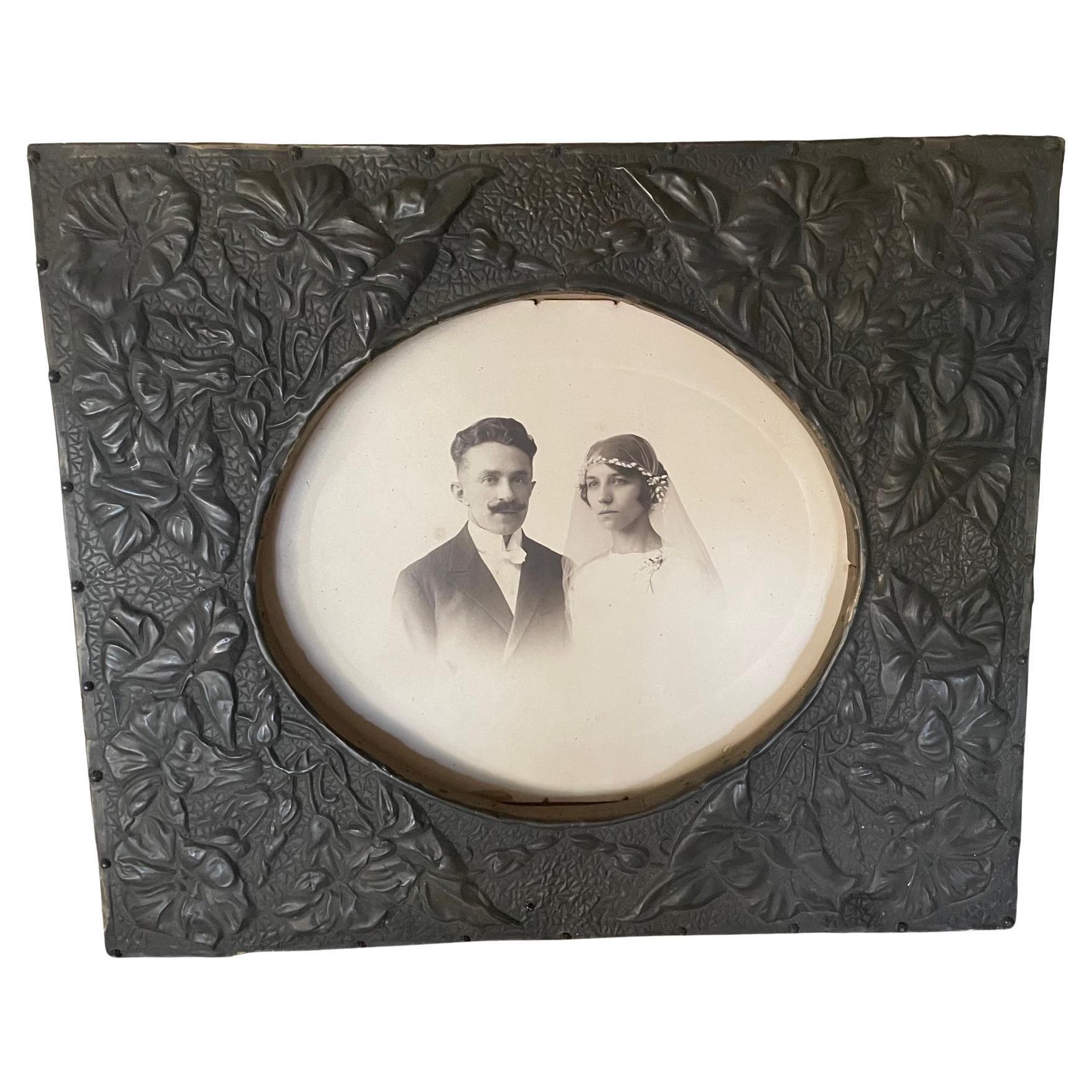 Photo frame in embossed copper