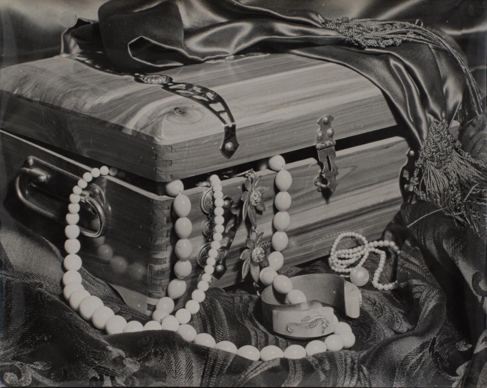 This photograph, depicting a jewelry box, was created by Bernard Darot. While it is unsigned, it comes from a lot of photographs both created and signed by Darot, confirming its provenance.

Bernard Darot was born in Saint-Cloud (Hauts-de-Seine) on