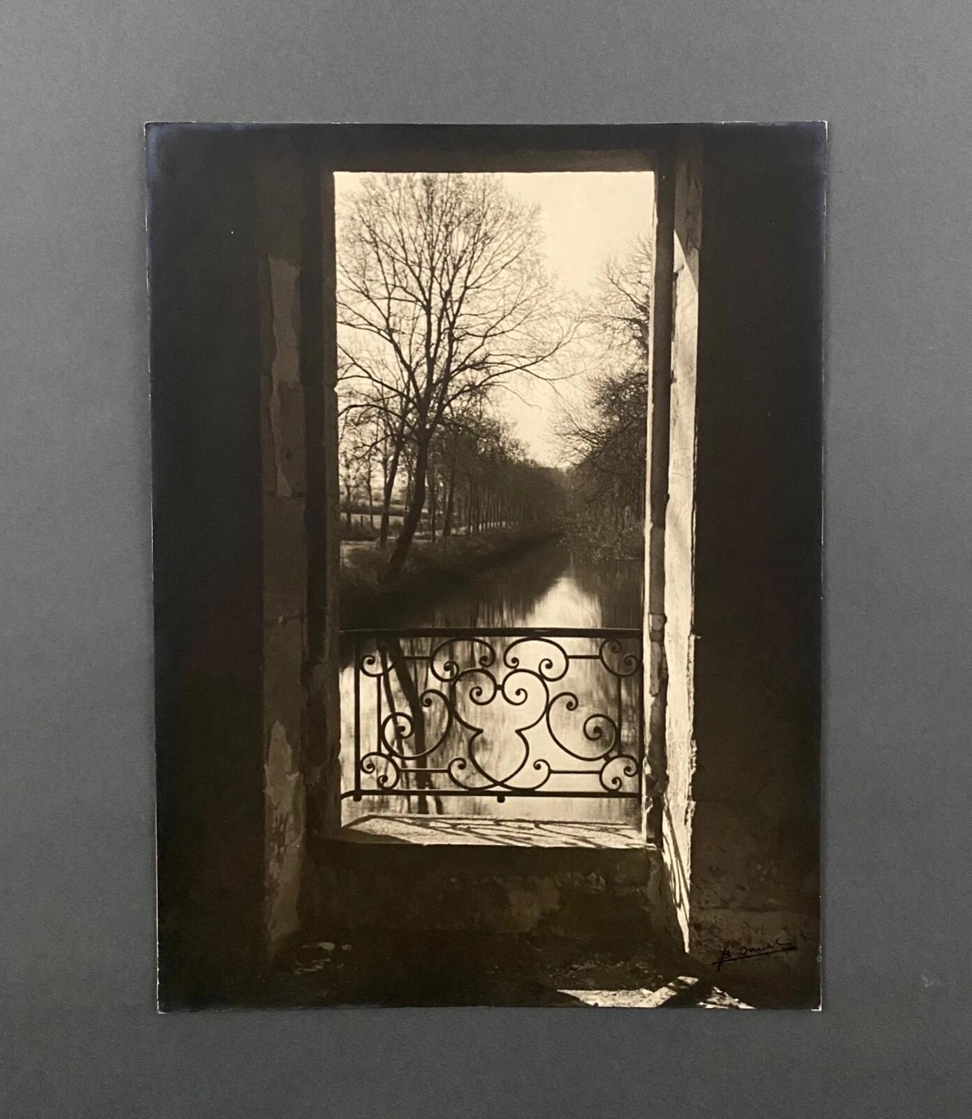 This original photograph is signed “B. Darot” in the lower right corner.

There is visible wear to the edges and corners, particularly the bottom right corner, along with signs of handling.
Please examine the photos carefully for a full appreciation