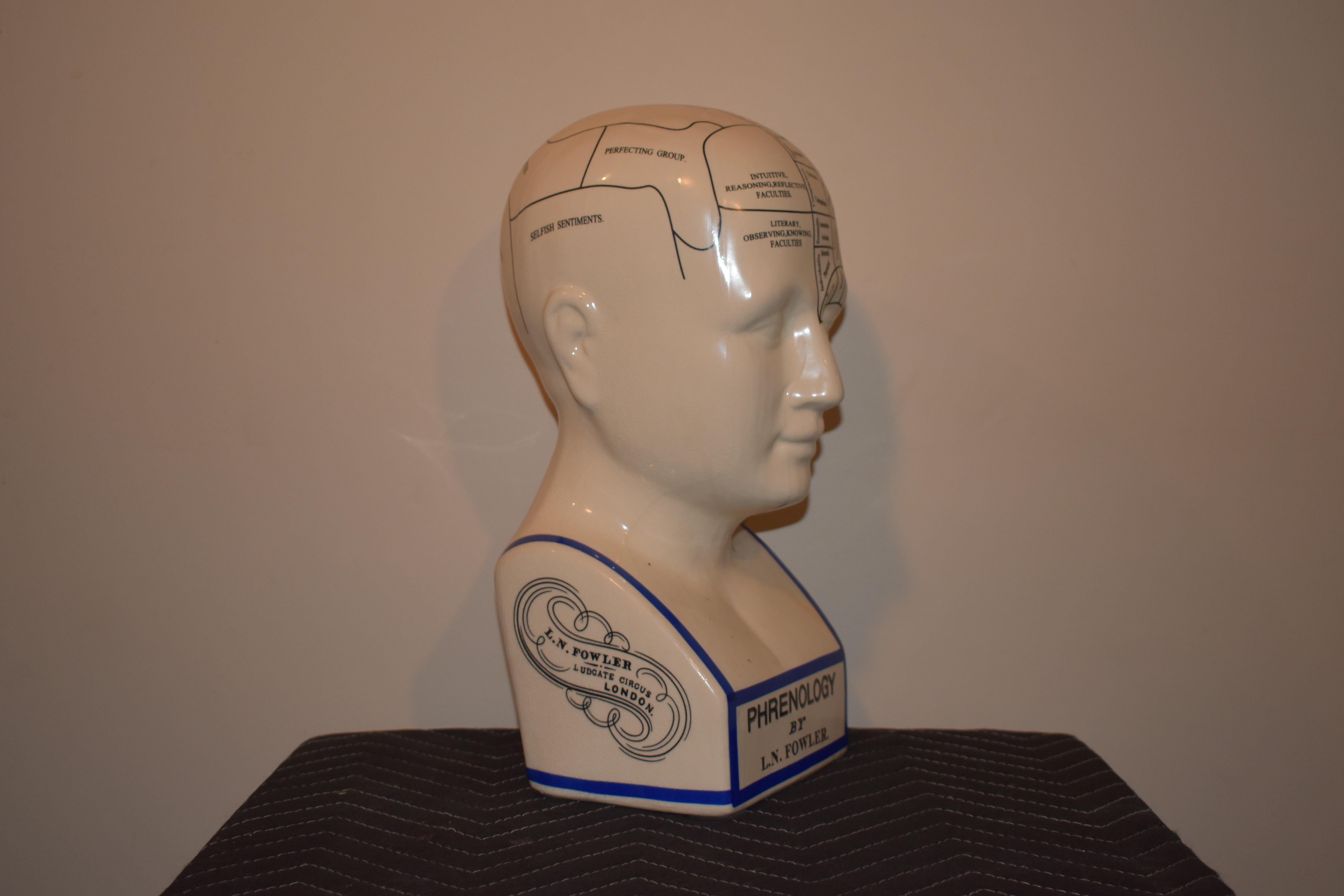 Phrenology by L.N Fowler. Later reproduction. Very good condition. Makes a great mantle piece or a place to store hats and headphones. 

Measures: 14