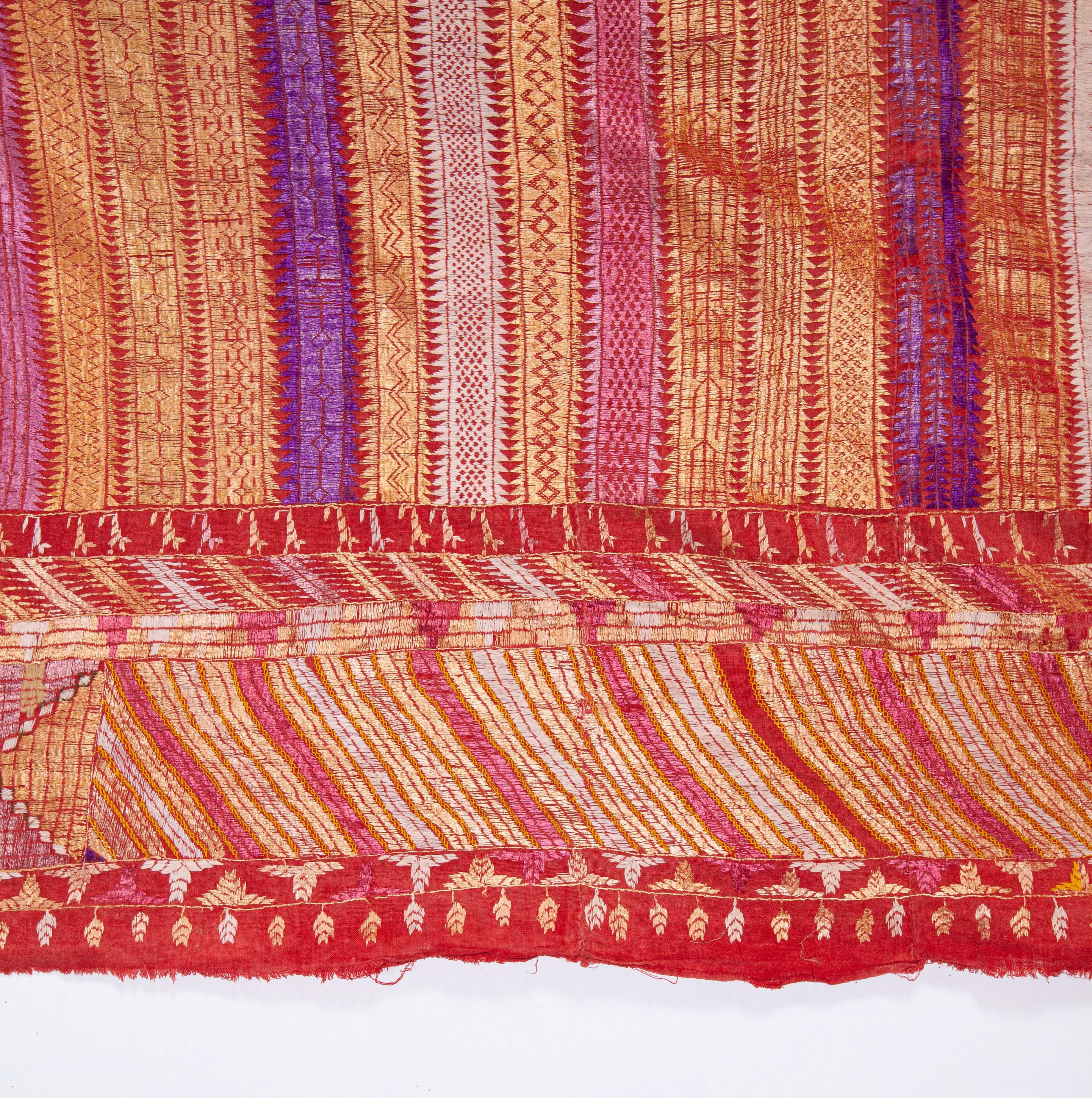 Silk and cotton embroidery done on hand loomed cotton.
 