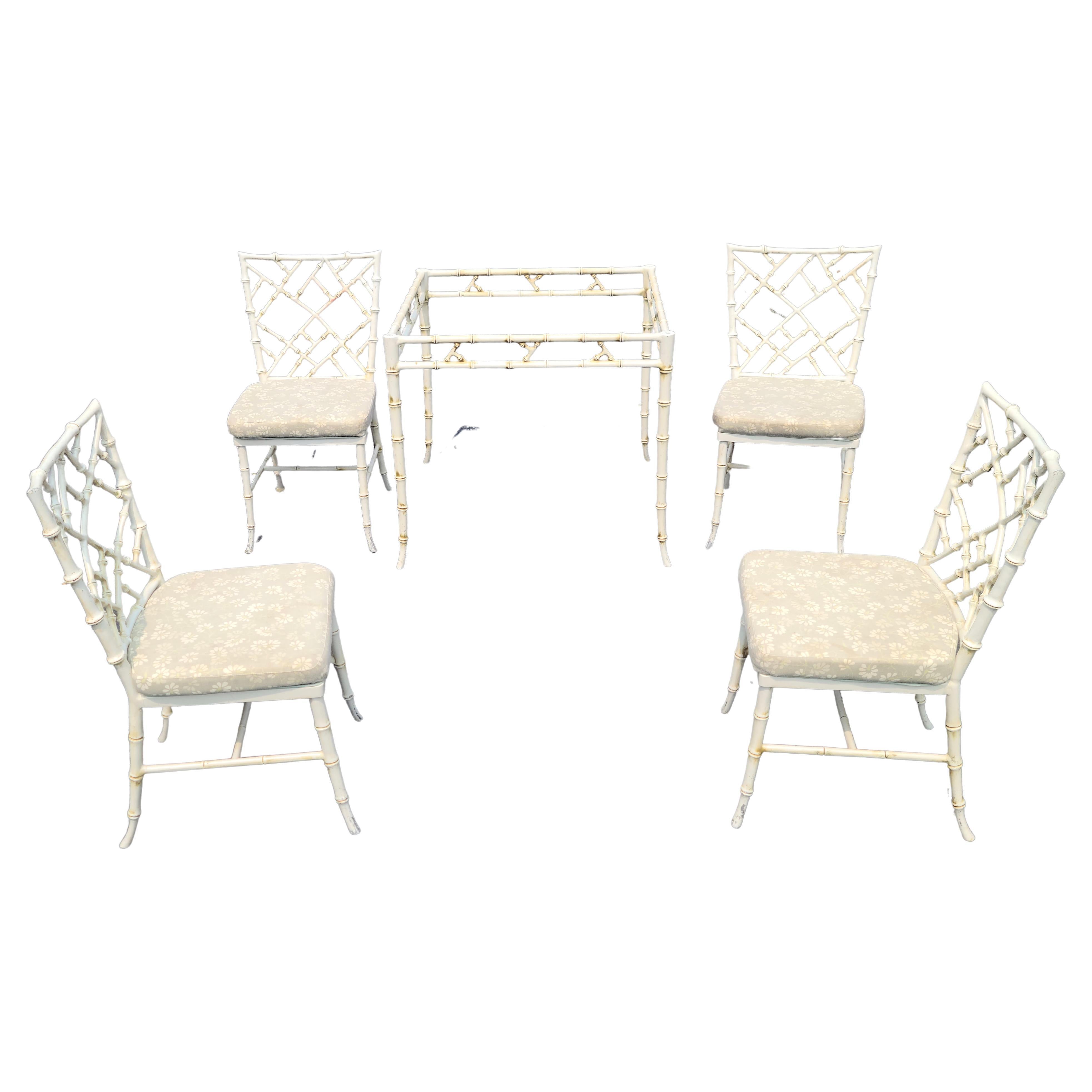 Please feel free to reach out for accurate shipping to your location.

No glass top for this set.

Table and four chairs by Phyllis Morris.
Bamboo theme cast in aluminum.