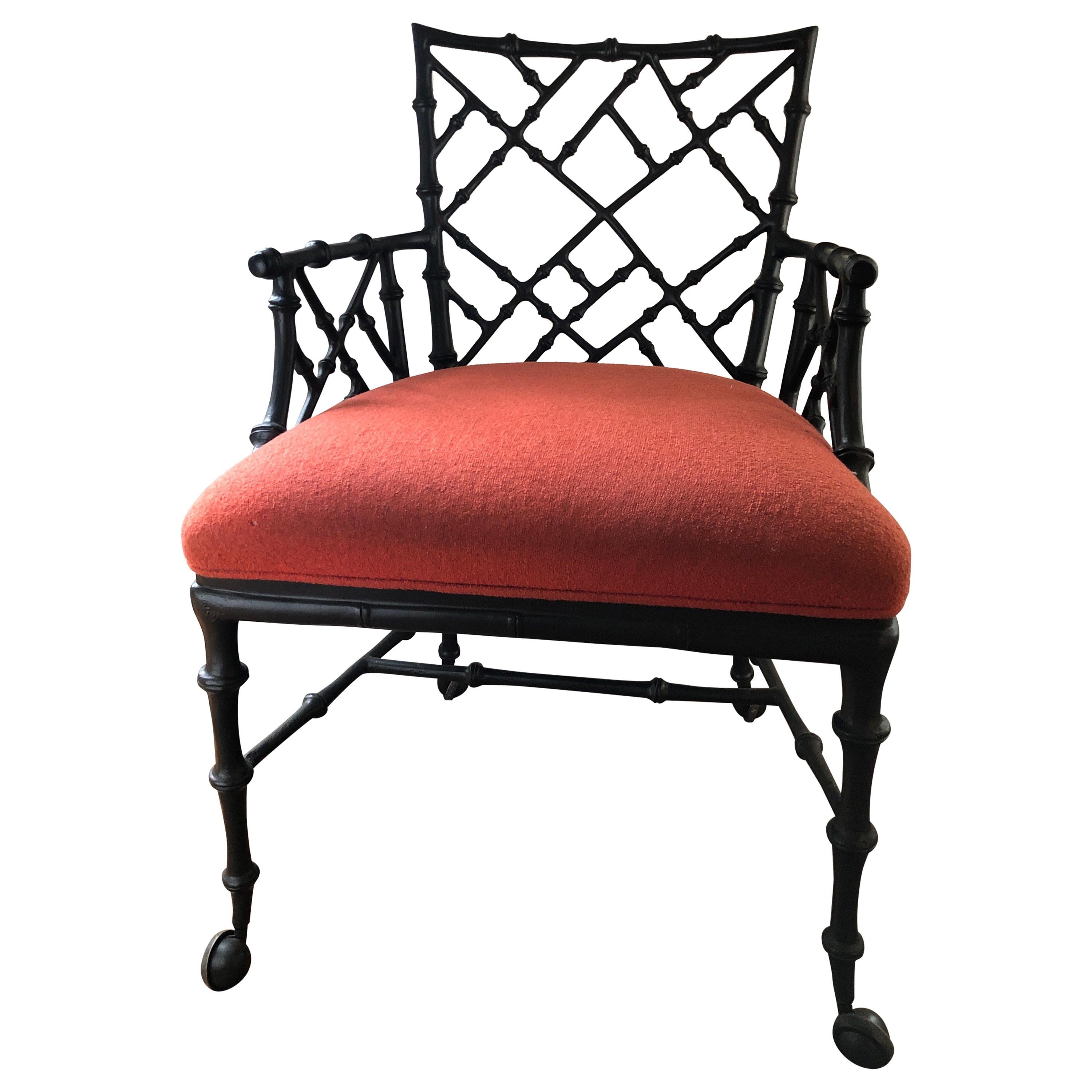 Phyllis Morris Faux Bamboo Ebony Iron Armchair on Casters For Sale