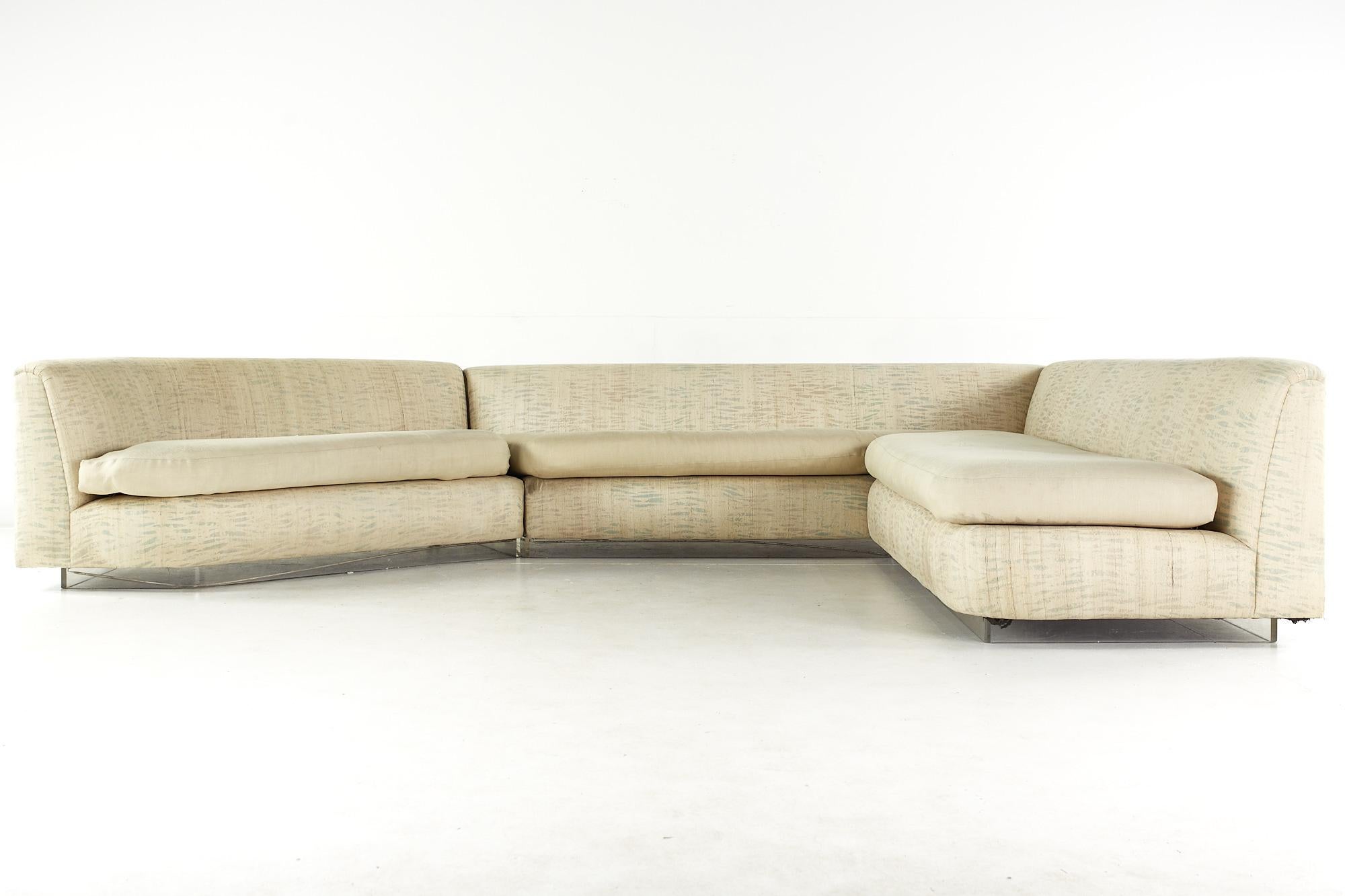 Phyllis Morris mid-century illuminated lucite base sectional sofa.

This sectional sofa measures: 147 wide x 111 deep x 28.5 inches high, with a seat height of 18 inches high.

All pieces of furniture can be had in what we call restored vintage