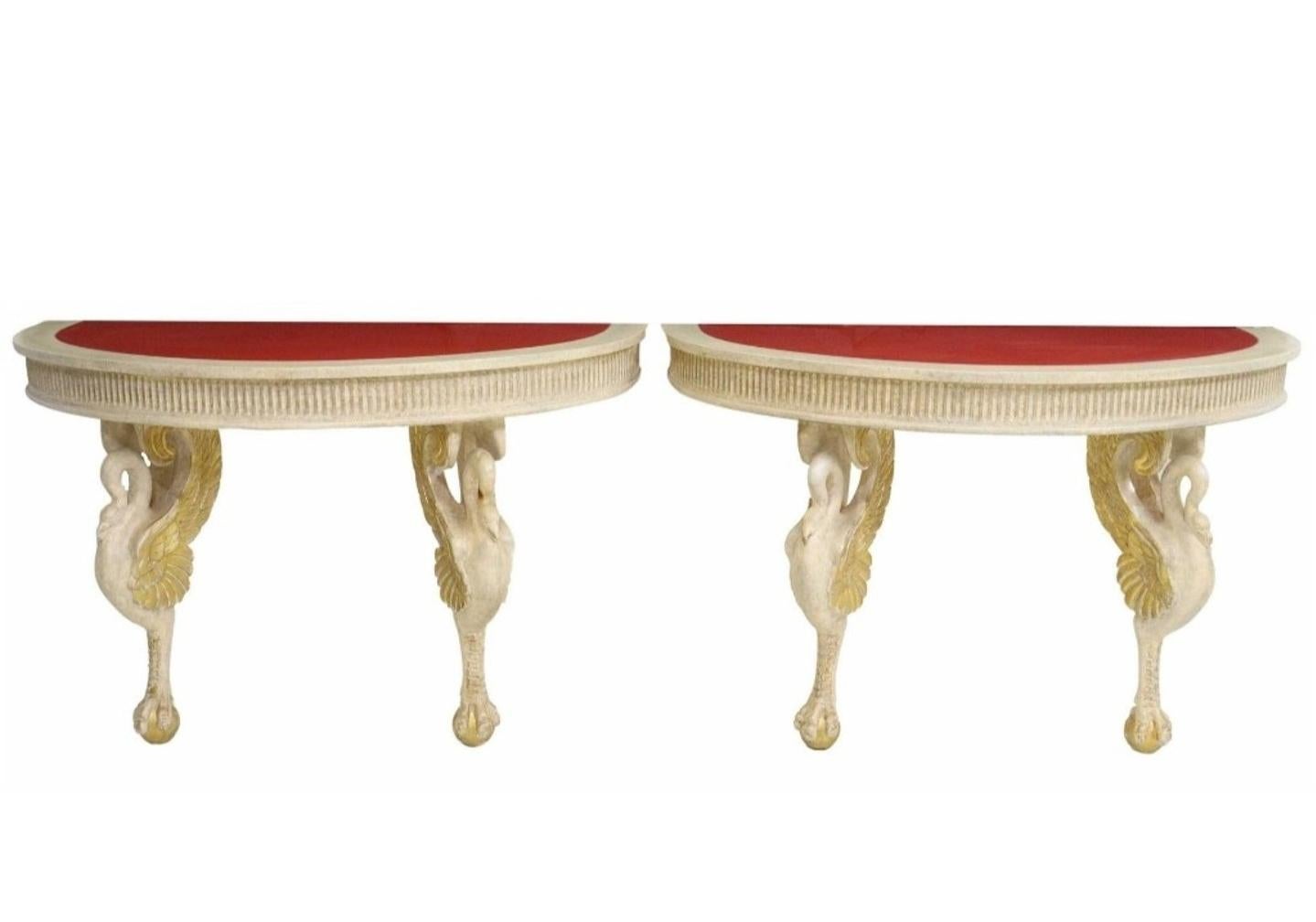 A fabulous pair of American mid-century sculptural paint decorated wooden console tables by the iconic luxury designer Phyllis Morris (United States; 1925-1988)

Executed in timeless mid-20th century glitz and glam Hollywood Regency Moderne taste,