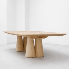 Mesa de comedor de diseño escultural de Travertine and Wood, de la colección Phylum, diseño contemporáneo
