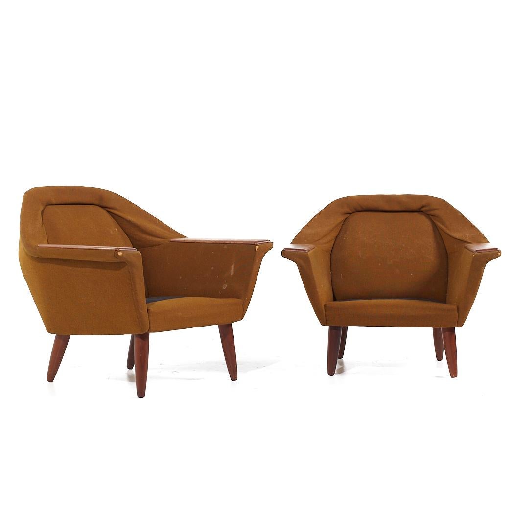 P.I. Langlo Mid Century Norwegian Teak Lounge Chairs - Pair

Each lounge chair measures: 33.75 wide x 31 deep x 29.5 high, with a seat height of 12 (sans seat cushion) and arm height/chair clearance 20 inches

All pieces of furniture can be had in