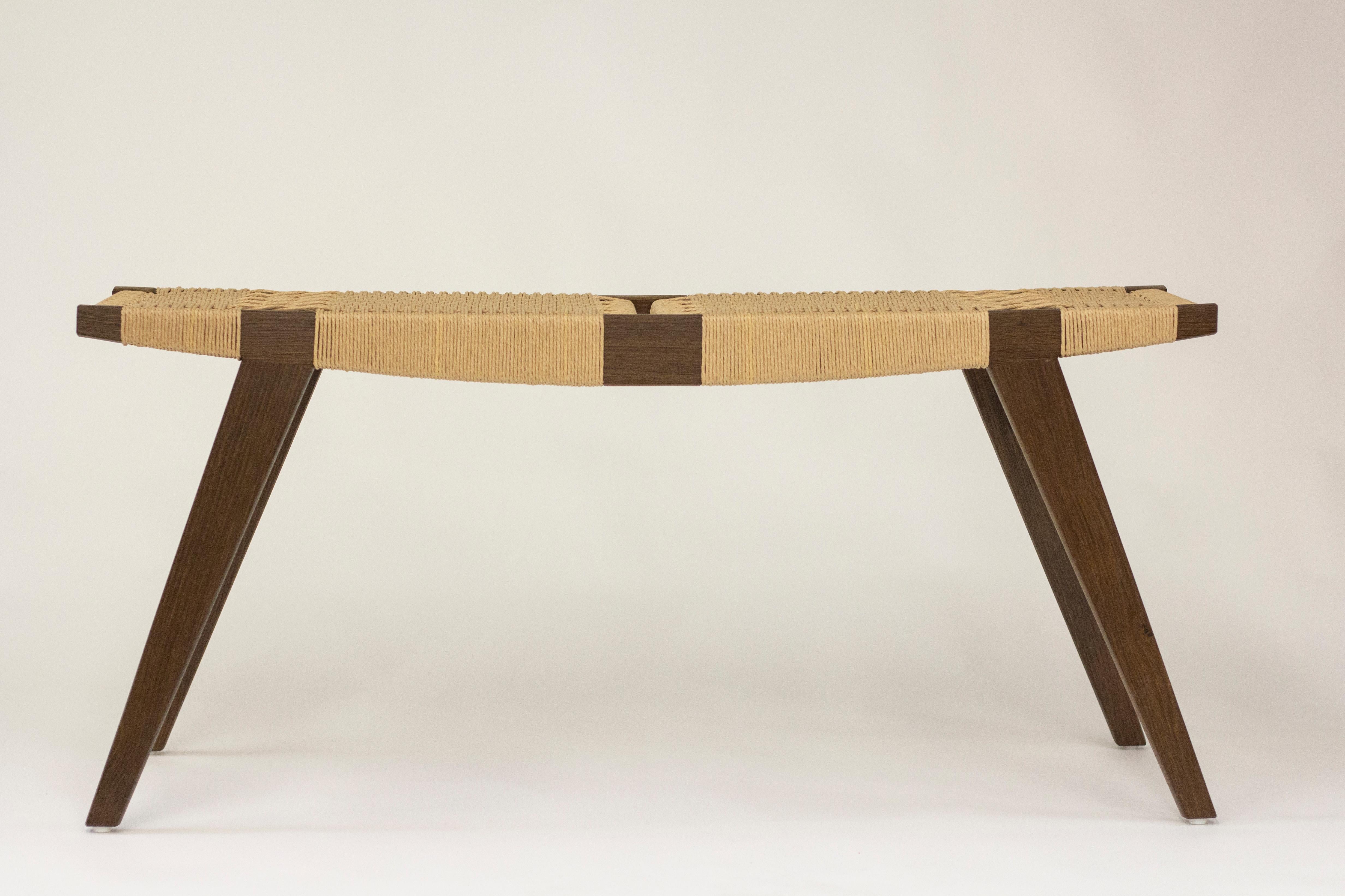 Contemporary bench in FSC British fumed oak with FSC natural Danish cord handwoven seat. Dimensions are approximately 120cm L x 44.3cm H x 33cm D. Available as a pair.

This set is ready made and available immediately, but can be made-to-order in