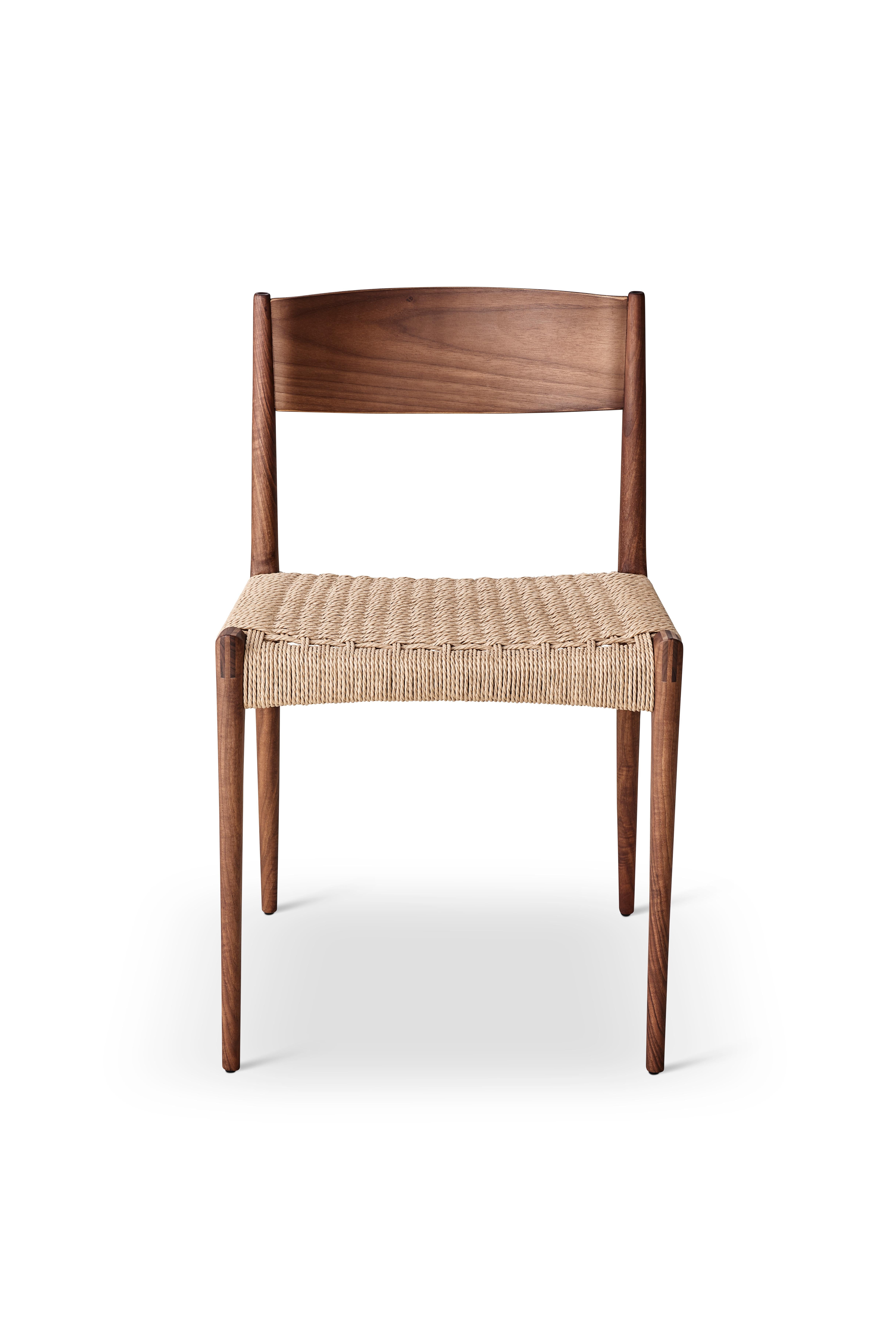 PIA chair
Solid oak frame, paper cordel seat
Dimensions: H 75 x 49 x 48 cm (seat height 45cm)

Wood:
– Oak
– Smoked oak
– Black lacquered oak
– Walnut

Paper cordel:
– Natural
– Black (Contact us)

--
The Pia chair signed by DK3 was