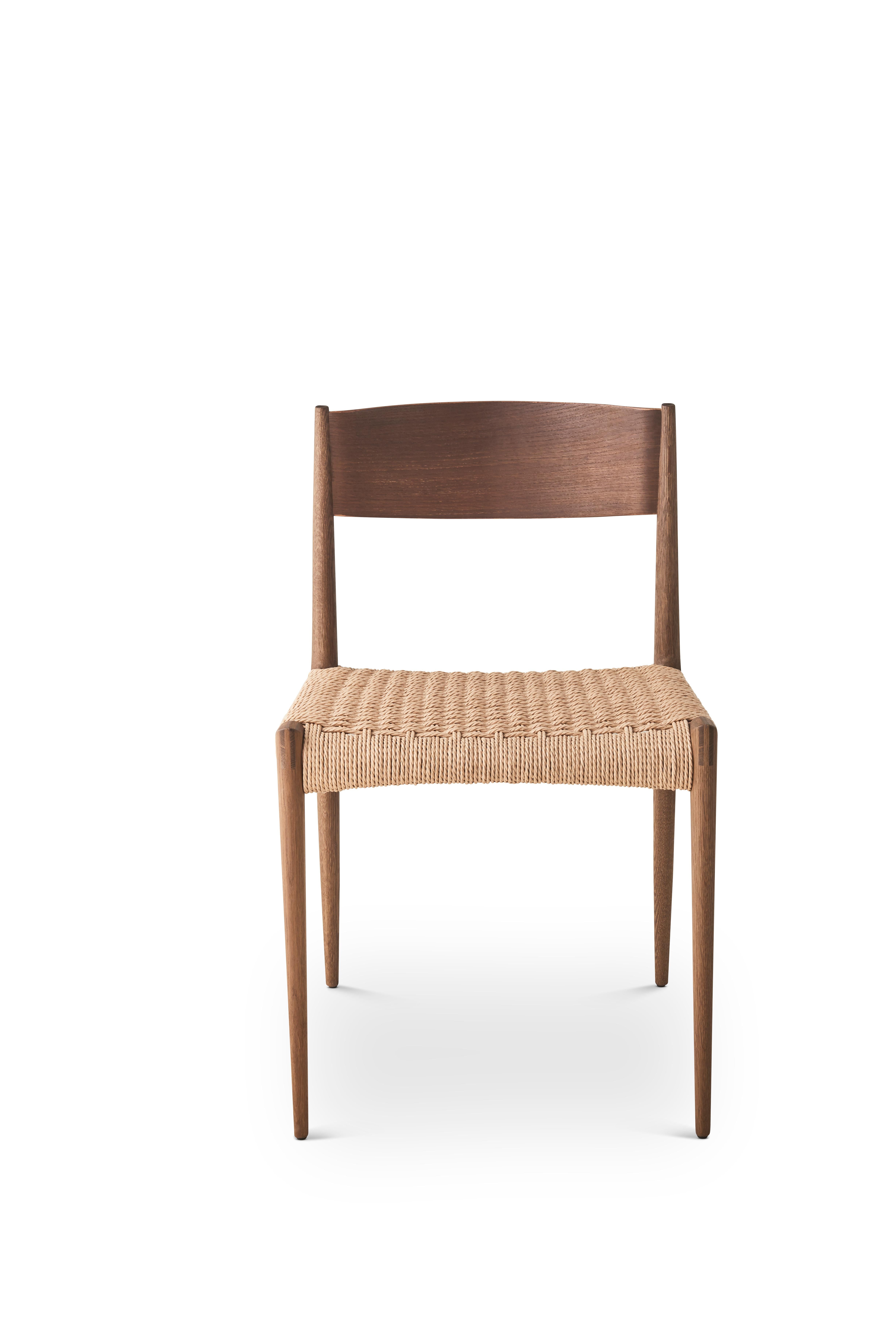 PIA chair
Solid oak frame, paper cordel seat
Dimensions: H 75 x 49 x 48 cm (seat height 45cm)

Wood:
– Oak
– Smoked oak
– Black lacquered oak
– Walnut

Paper cordel:
– Natural
– Black (Contact us)

--
The Pia chair signed by DK3 was imagined and