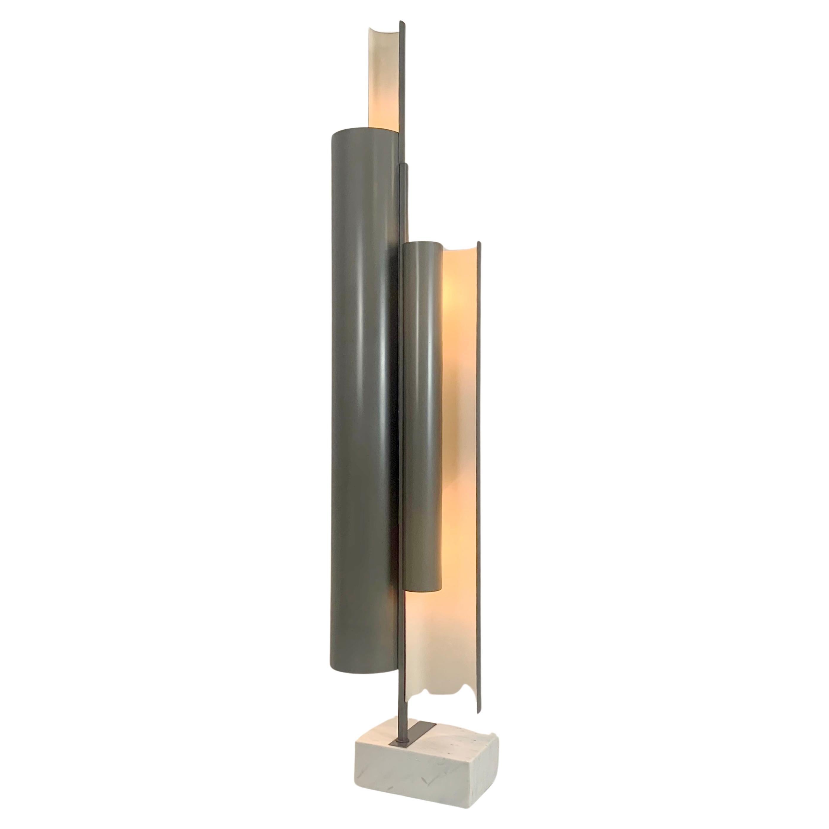 Impressive floor lamp by Pia Crippa Guidetti for Lumi, circa 1970, Italy.
Lacquered aluminum, metal, marble.
Dimensions: 203 cm H, 44 cm W, 26 cm D.
Two switches, 6 E27 bulbs .
Rare model in is original condition.
All purchases are covered by our