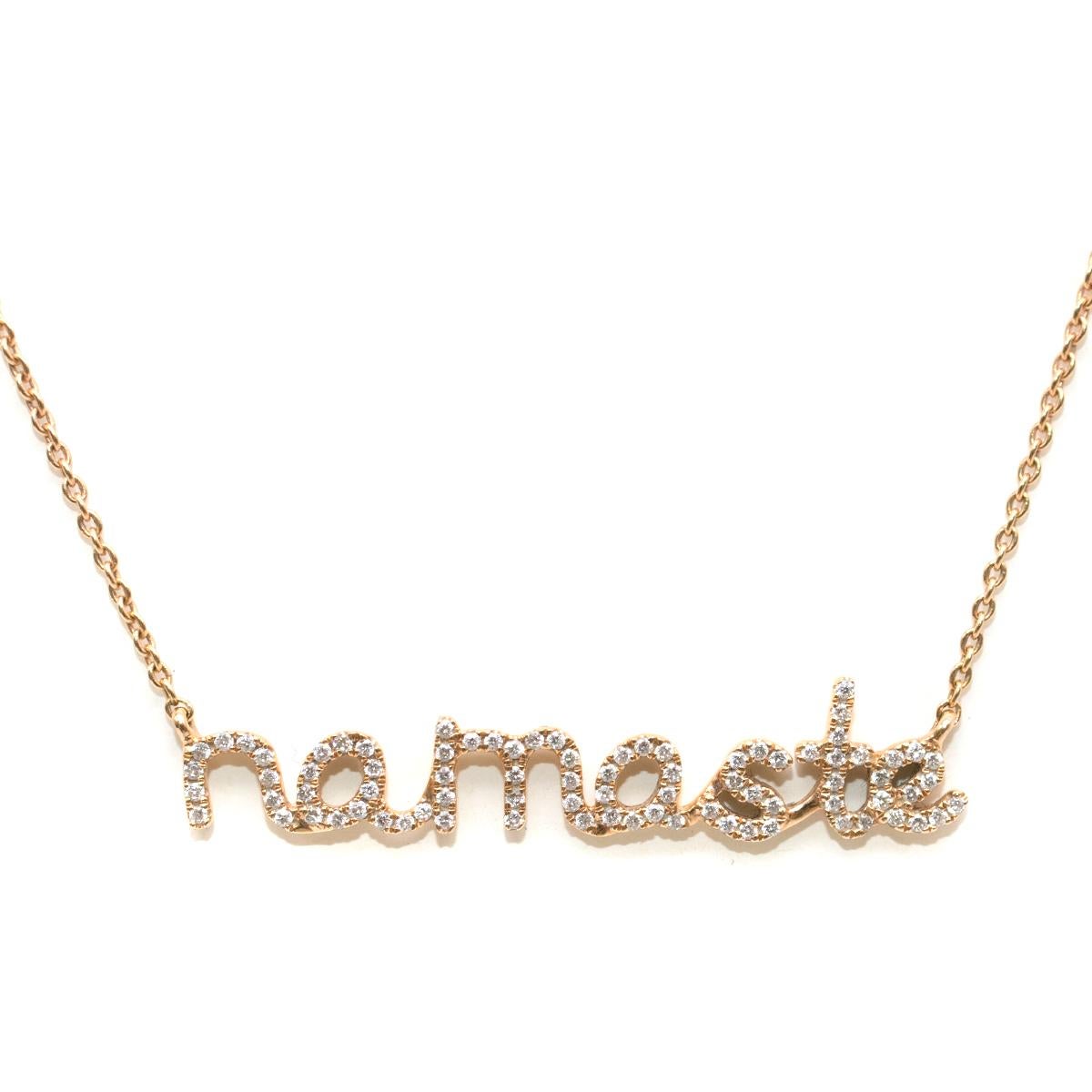 Pia Hallstrom Rose Gold Namaste Necklace

- 18k Rose gold necklace with white diamonds
- Brand new with box
- 'Namaste' encrusted with 0.23ct high quality diamonds
- Fine chain
- Lobster clasp closure
- End of line stock

Please note, these items