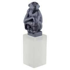 Pia Langelund for Royal Copenhagen. Chimpanzee figure in bisquit on a glass base