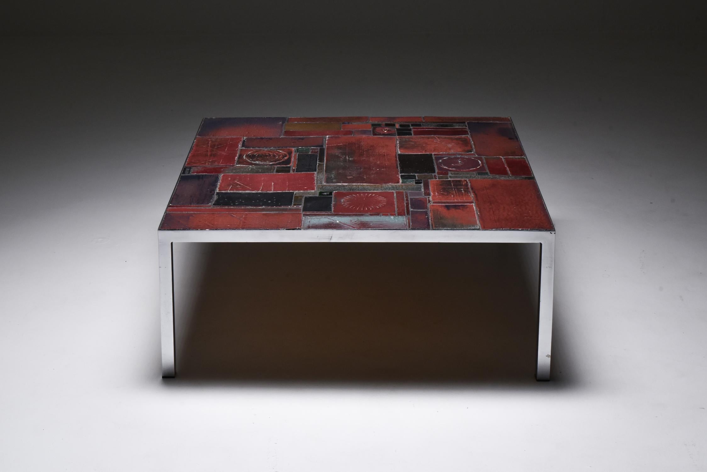 Pia Manu, coffee table, slate, chromed steel, Belgium, 1960s

This unique, handmade coffee table with chromed steel frame is designed in the workshop of Pia Manu. The table top is a true eye-catcher. With its subtle tones of reds and black the