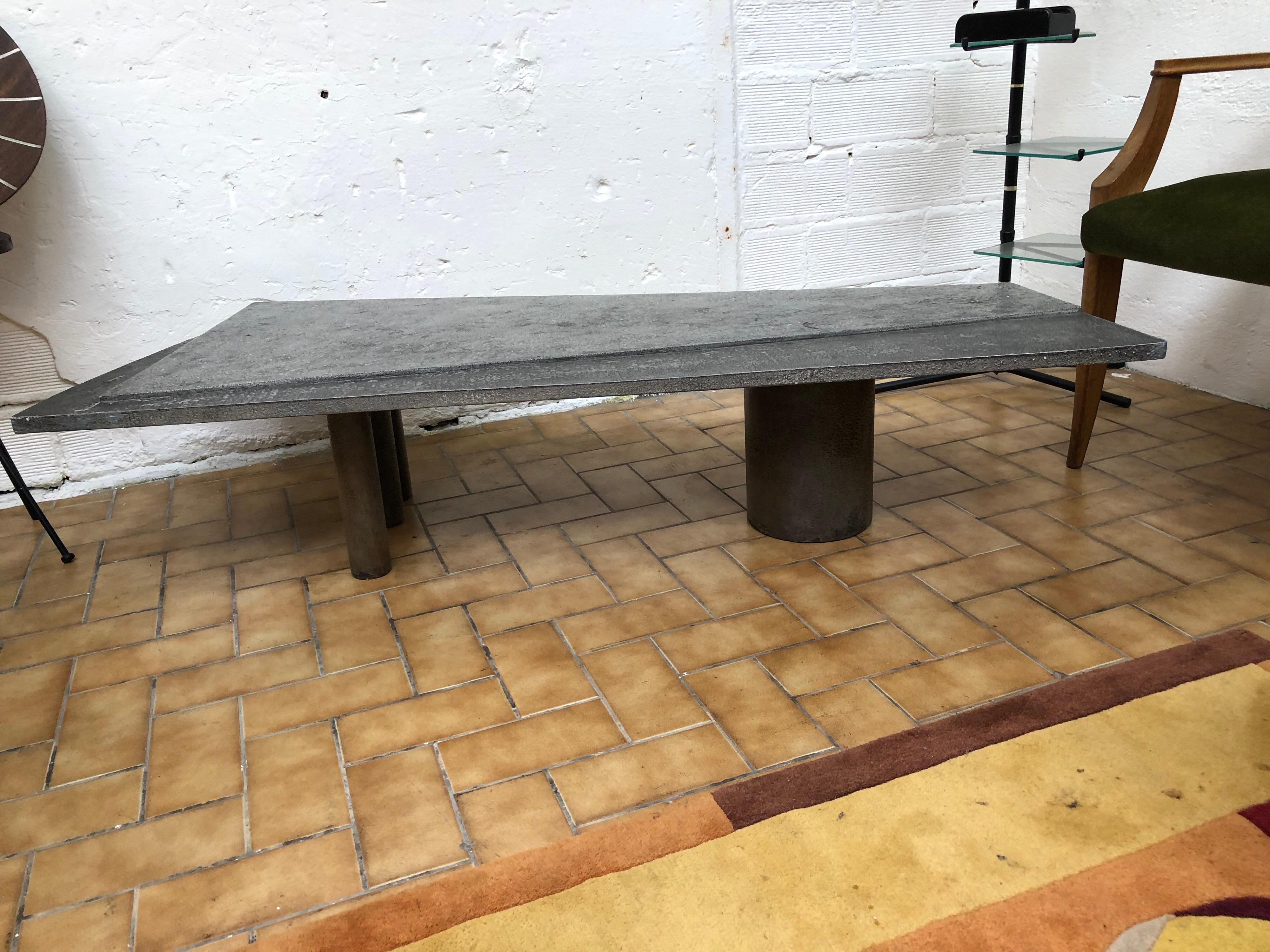 Beautiful Brutalist coffee table designed and made by the legendary Belgian company Pia Manu
The specific table is made out of a mixed ceramic and aluminium top with a metal base
the shape is a futuristic look to it and was ahead of its time as