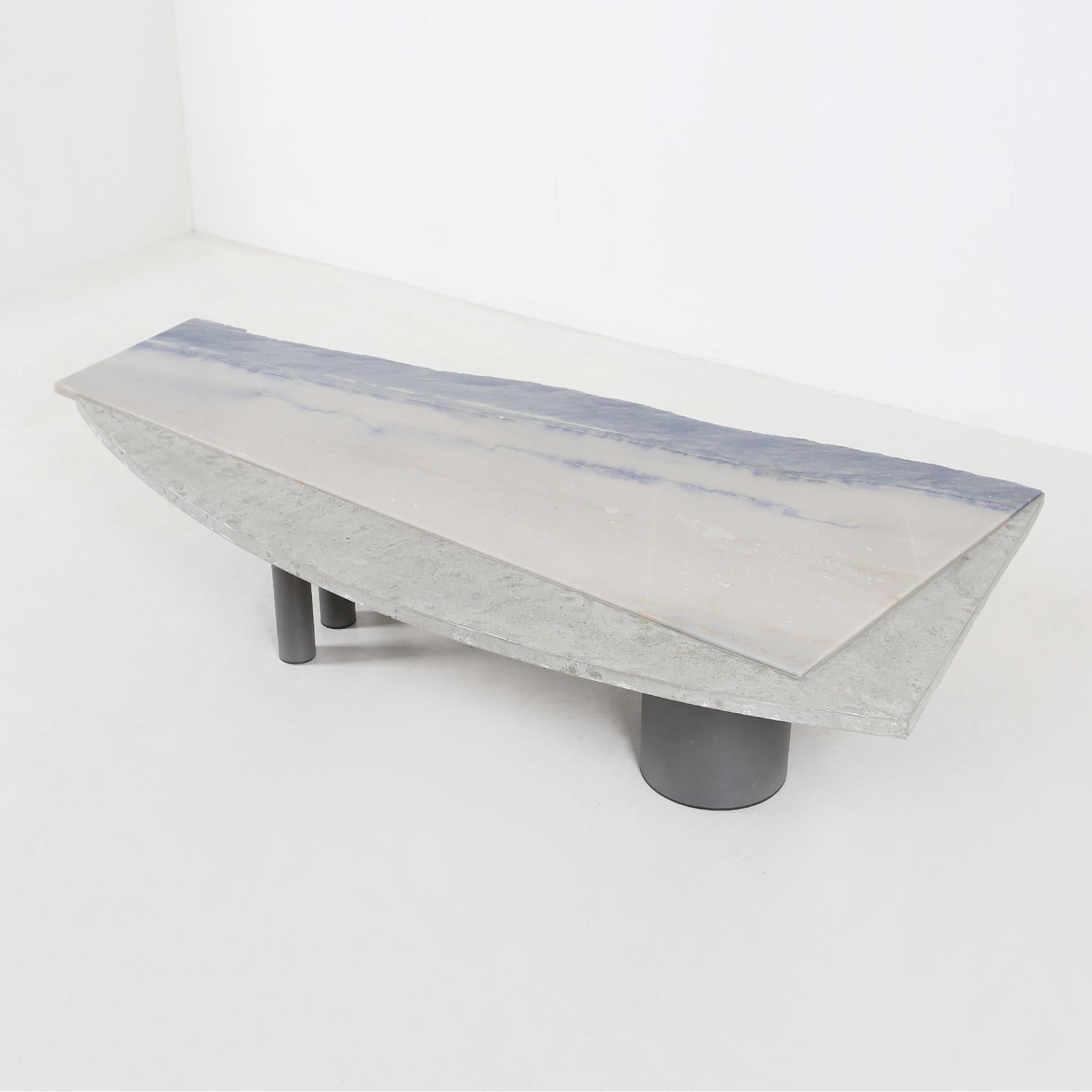 Rare Pia Manu table with a natural stone in dark blue and a metal tin edge.
The dark blue of the natural stone gives the table an exclusive and calm look.
This item is made with the greatest care and the best material.