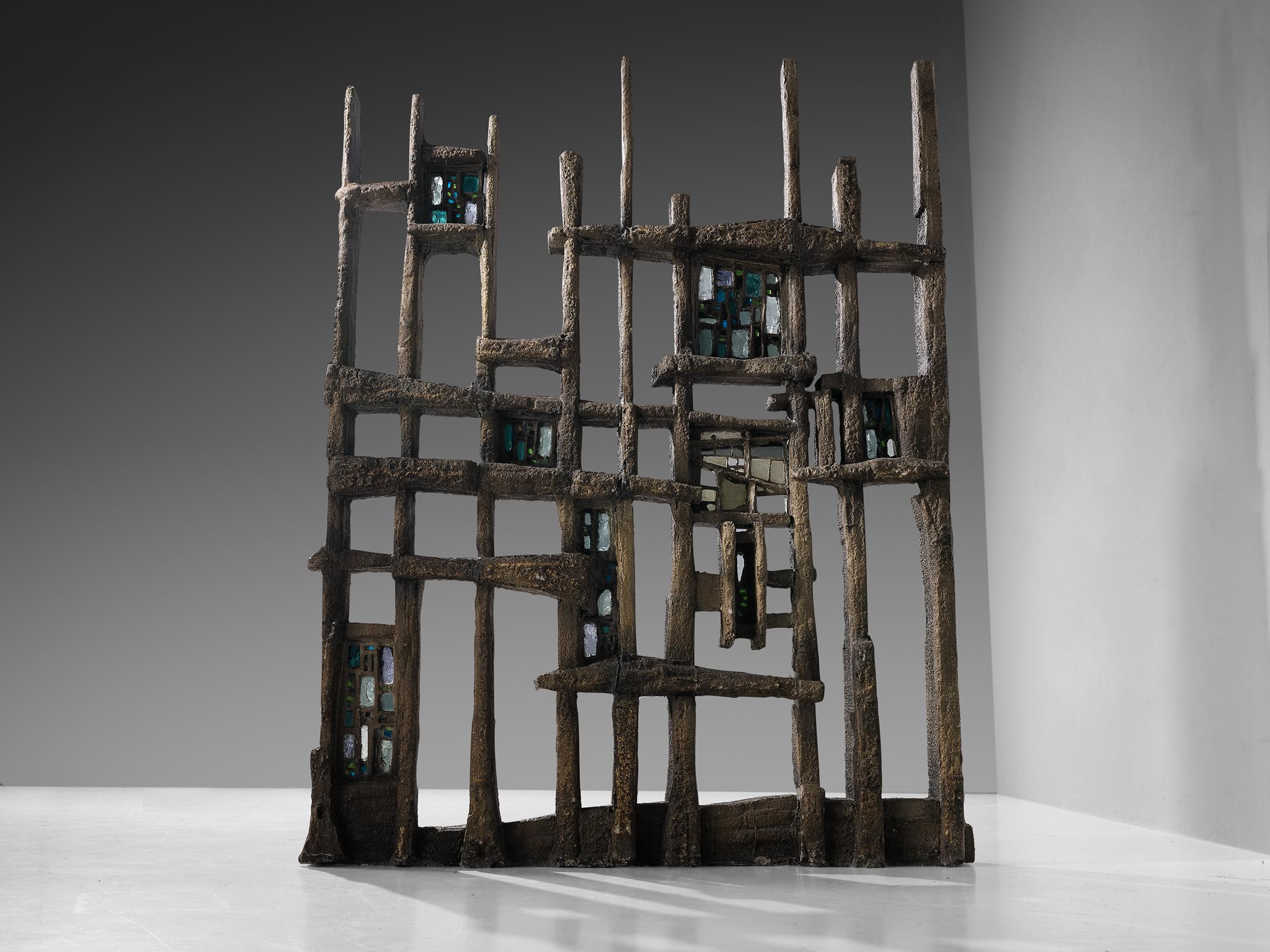 Pia Manu, room divider, burnished concrete, stained glass, steel, Belgium, 1970s

This unique piece of art is assembled in the workshop of Pia Manu and is a great testament to their expertise in materialization and remarkable craftsmanship. The