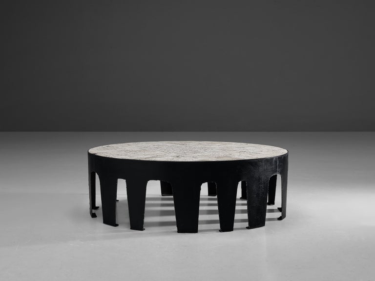 Pia Manu, coffee table, travertine, metal, Belgium, 1960s 

This unique, handmade coffee table with cut and wrought iron frame is designed in the workshop of Pia Manu. The frame was made with several legs and subsequently inlayed with travertine.