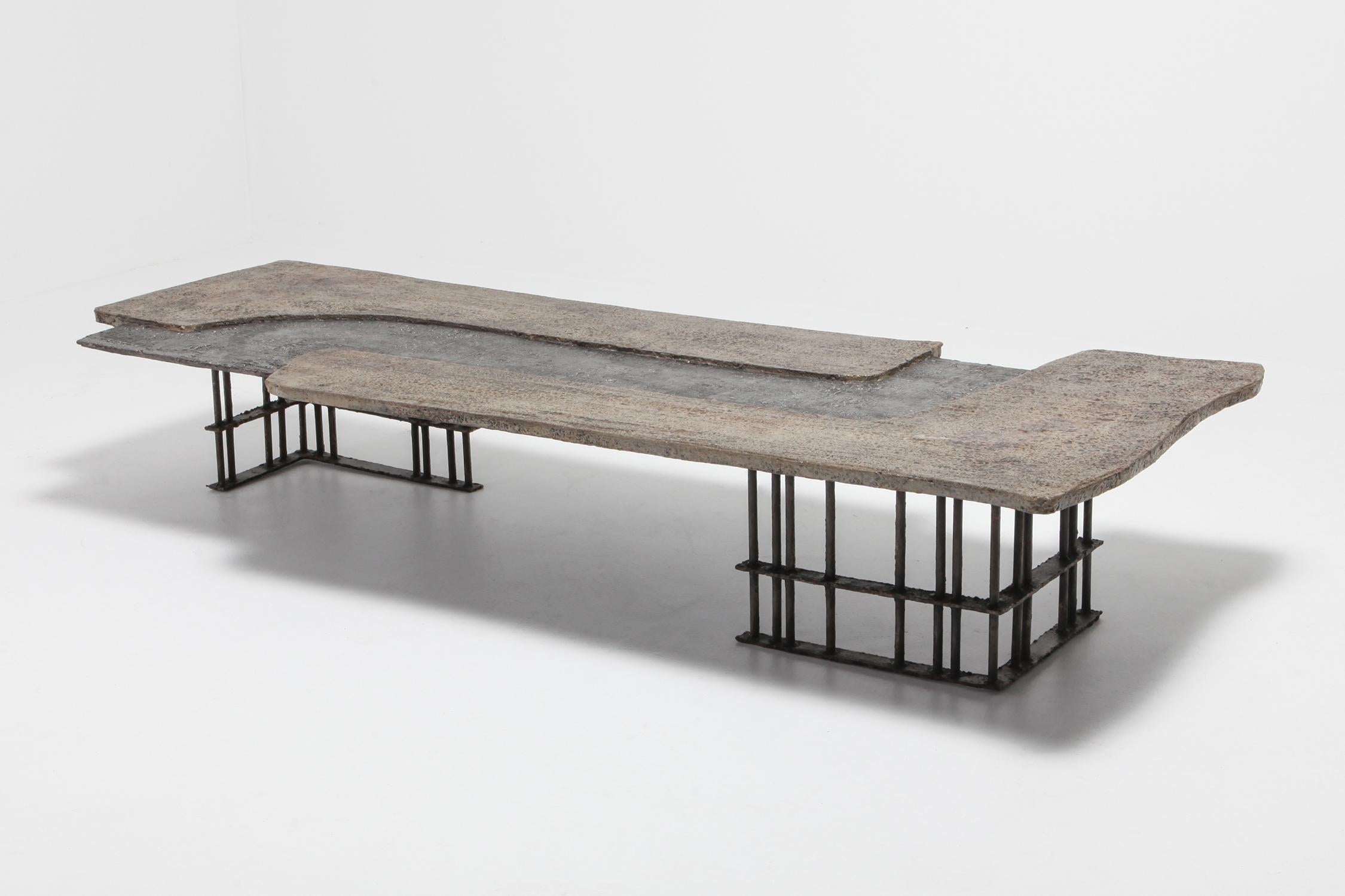 Collectible Brutalist coffee table, Jules Dewaele, Pia Manu, Belgium 1970s

Slate, concrete and cast aluminum top on forged iron base
This is a unique piece with complete authenticity report available from the son of Jules Dewaele. A True high