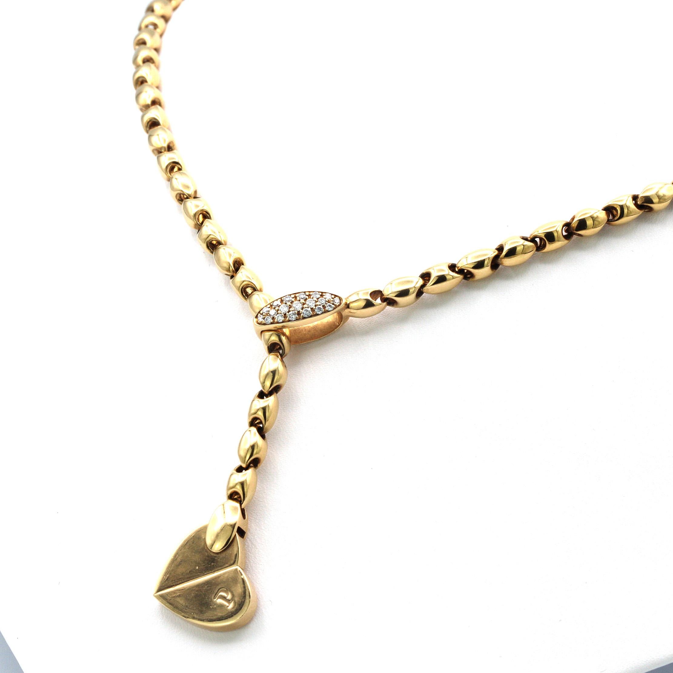 This Piaget Necklace features a Heart pendant made of 18K yellow Gold with Diamonds.
Beautiful pendant necklace for a casual outfit with just enough sparkle.

The heart pendant twists to open and close the necklace.

The length of the chain is