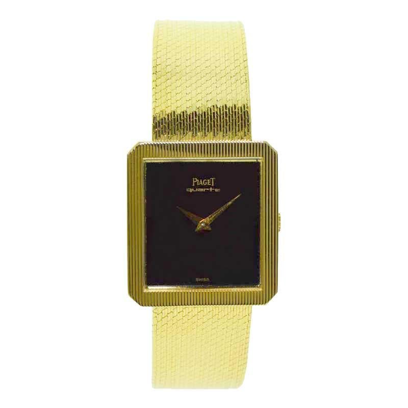 FACTORY / HOUSE: Piaget Watch Company
STYLE / REFERENCE: Dress Model with Original Factory Bracelet
METAL / MATERIAL: 18Kt. Yellow Gold 
CIRCA / YEAR: 1970's
DIMENSIONS / SIZE: 39mm X 24mm
MOVEMENT / CALIBER: Quartz Movement
DIAL / HANDS: Original