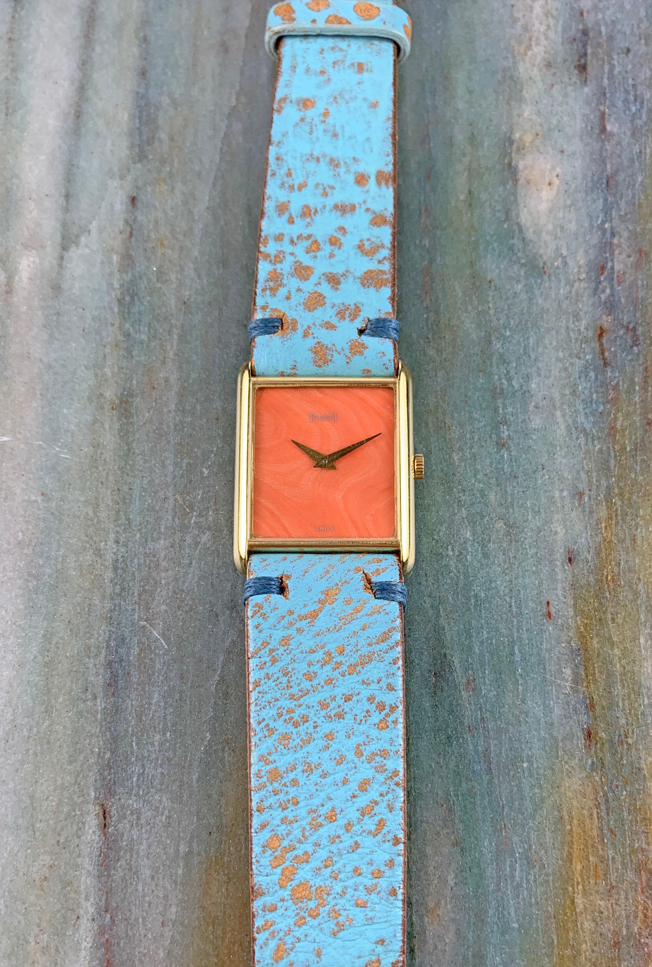 Piaget 18K Yellow Gold Manual Wind Tank Watch
Factory Piaget Coral Dial
Signed and Engraved Case-Back
18K Yellow Gold Case
20mm x 25mm
Fitted on a Custom Handmade Leather Strap
One Year Warranty on Movement and Parts and Letter of Authenticity