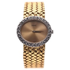 Piaget 18 Karat Yellow Gold Vintage Manual Ladies Watch with Diamond Bezel