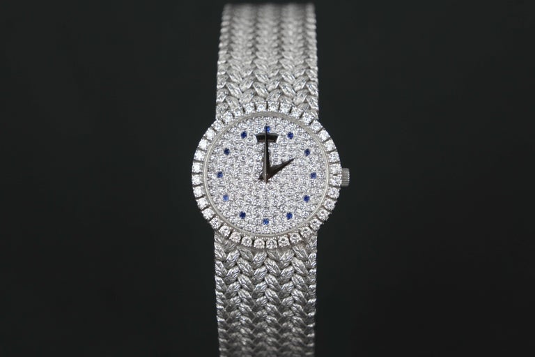 Piaget 18K White Gold 8706 D2

ITEM DETAILS
Serial Number: 915015-02
Reference Number: 8702 D2
Case: 24 mm
Length: 20 cm
Width: 14 mm
Weight: 73.63 grams

Year: Unknown
Movement: Quartz
Jewels: 4
Caliber: 857P
Bracelet Material: White Gold
Bracelet
