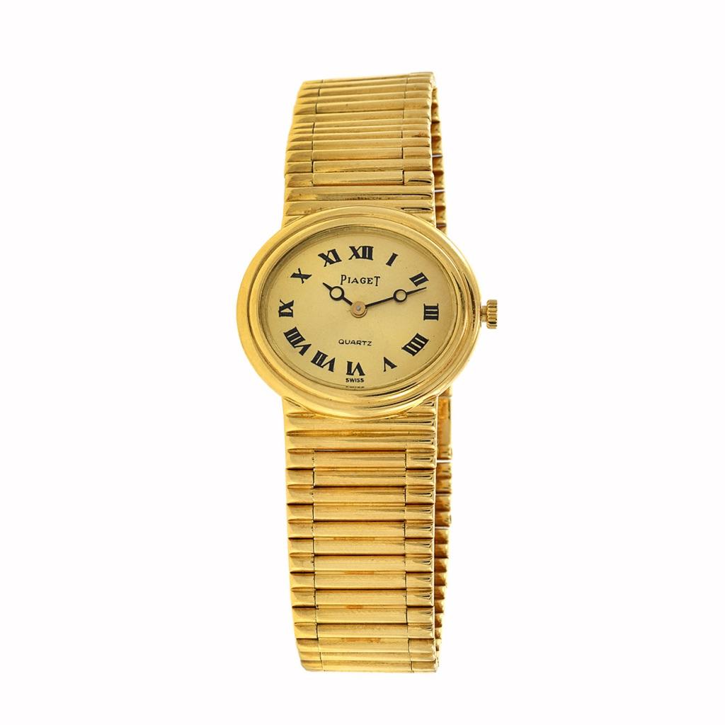 Immerse yourself in the glamour of the 1980s with the Vintage 1980s Piaget 18kt Yellow Gold Watch. Encased in opulent 18kt yellow gold, both in its 30 x 32mm oval case and bracelet, this timepiece exudes a timeless allure. The gold dial, adorned