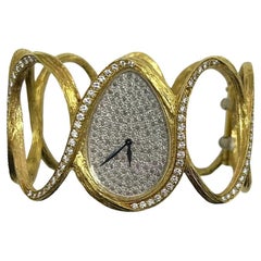 Piaget 18k Gold 
Diamond Bangle Watch