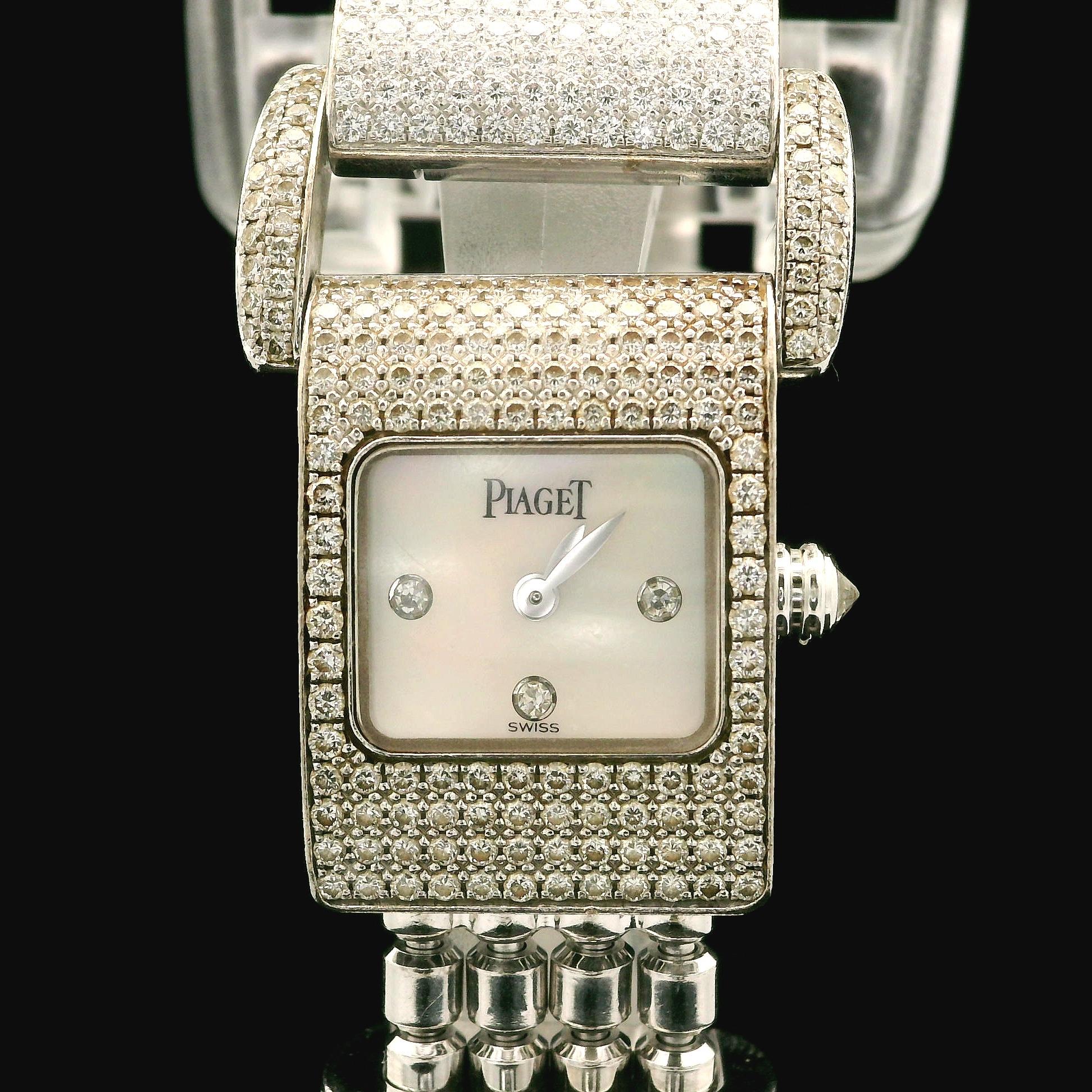 --Stones:--
254 Natural Genuine Diamonds - Round Brilliant Cut - Pave Set - D-G Color - IF-VVS Clarity - 2ctw

Case Material: 18k White Gold
Height: 23.9mm (lug to lug)
Case Size: 17.3mm (Not including the crown)
Band Material: 18k White Gold
Band