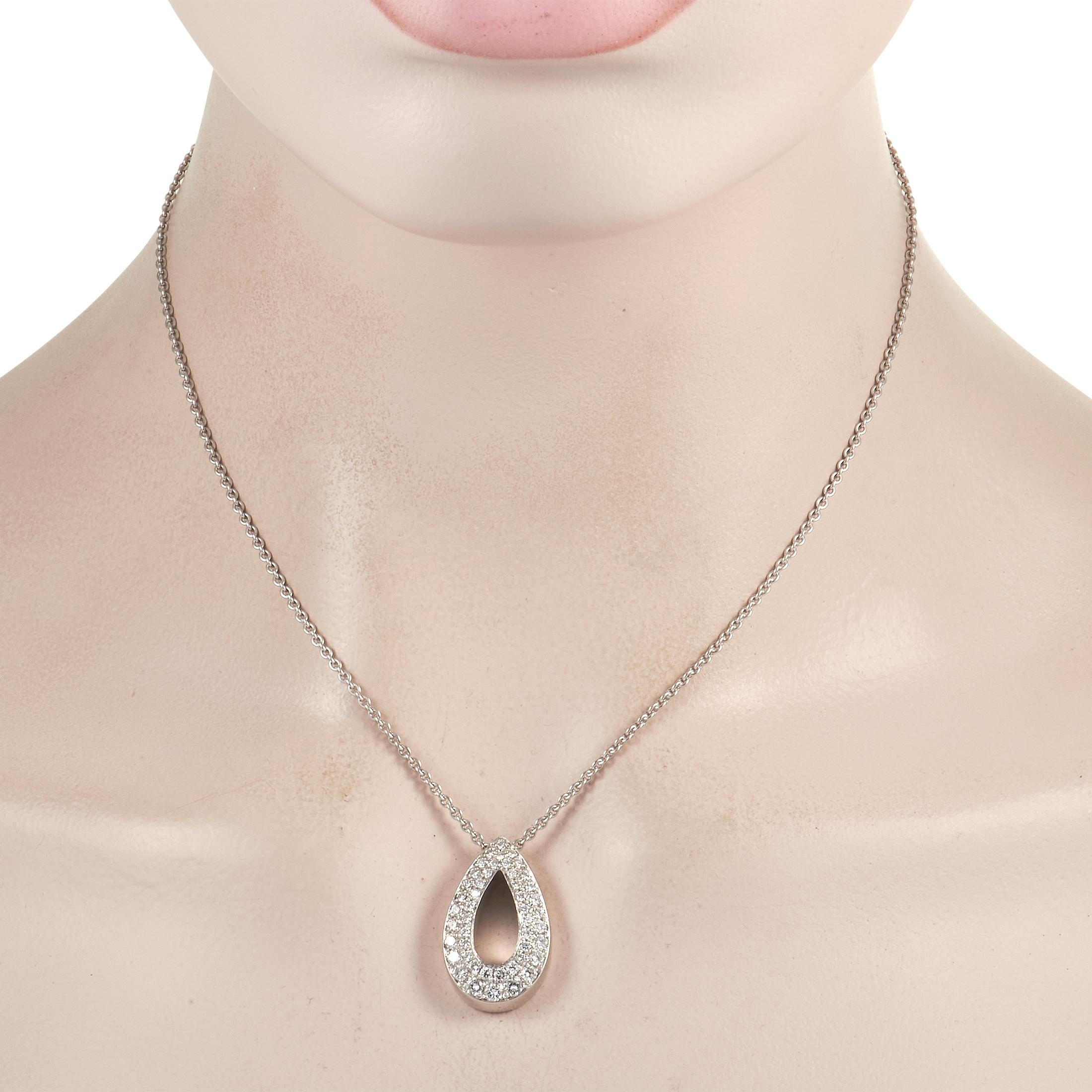 Bold and breathtaking, this Piaget necklace is a luxury piece with an unforgettable sense of style. Suspended from a delicate 16” chain, an 18K White Gold pear-shaped pendant measures 1” long, 0.65” wide, and comes to life thanks to a dramatic