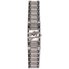 Reloj Piaget de oro blanco de 18 quilates con MOP y esfera de diamantes, años 80