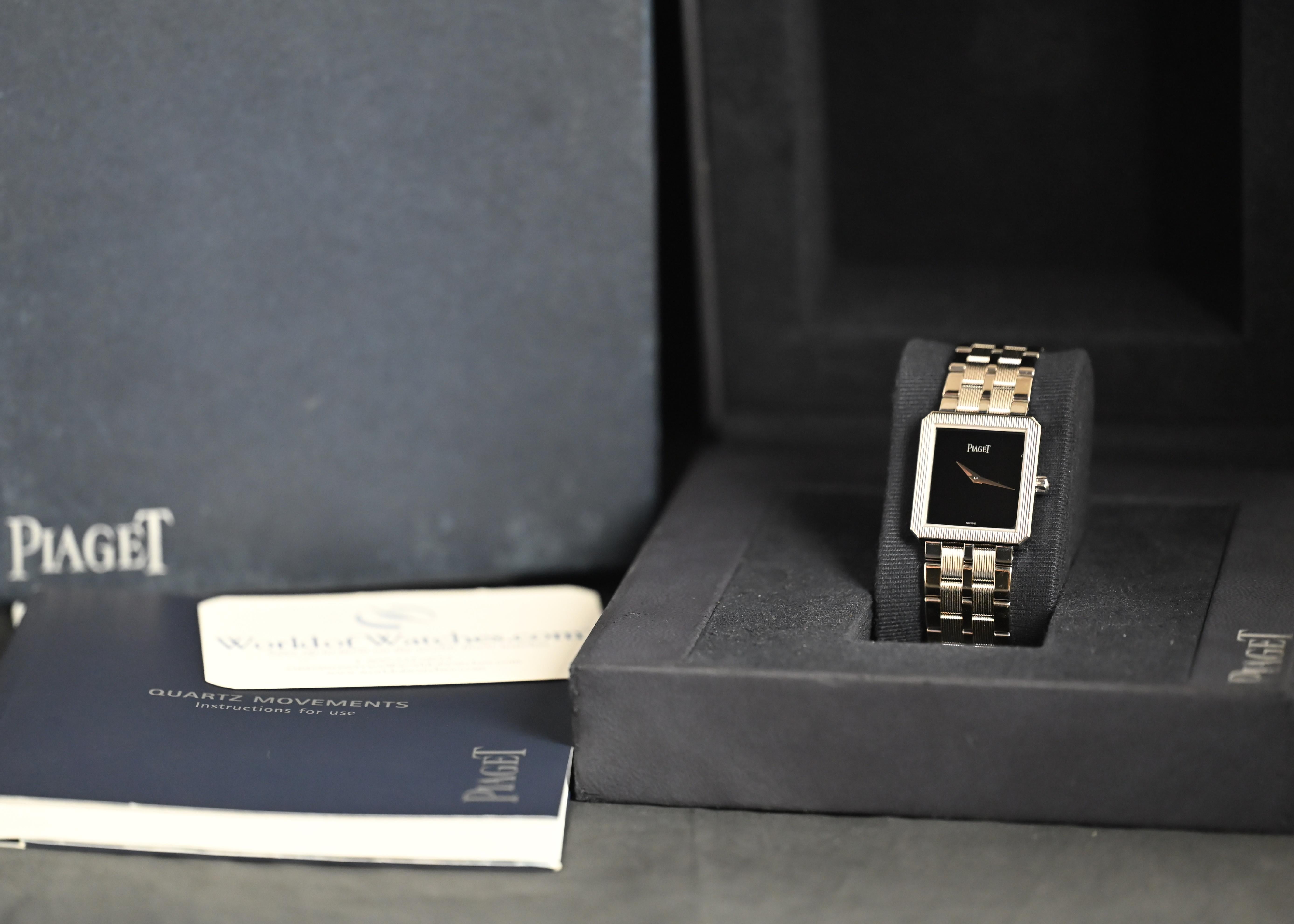 Brand: Piaget
Model: 50154 M601D
Serial number: 81xxxx

Reference: C04008

Case: Show sign of wear 18K White Gold Rectangular Case with approximate size 28mm x 25mm along with serial number engraved on case back

Dial: Excellent Condition Onyx Stone