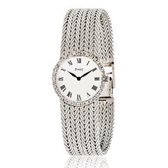Piaget 18k White Gold White Round Dial Diamond Bezel Wrist Watch
