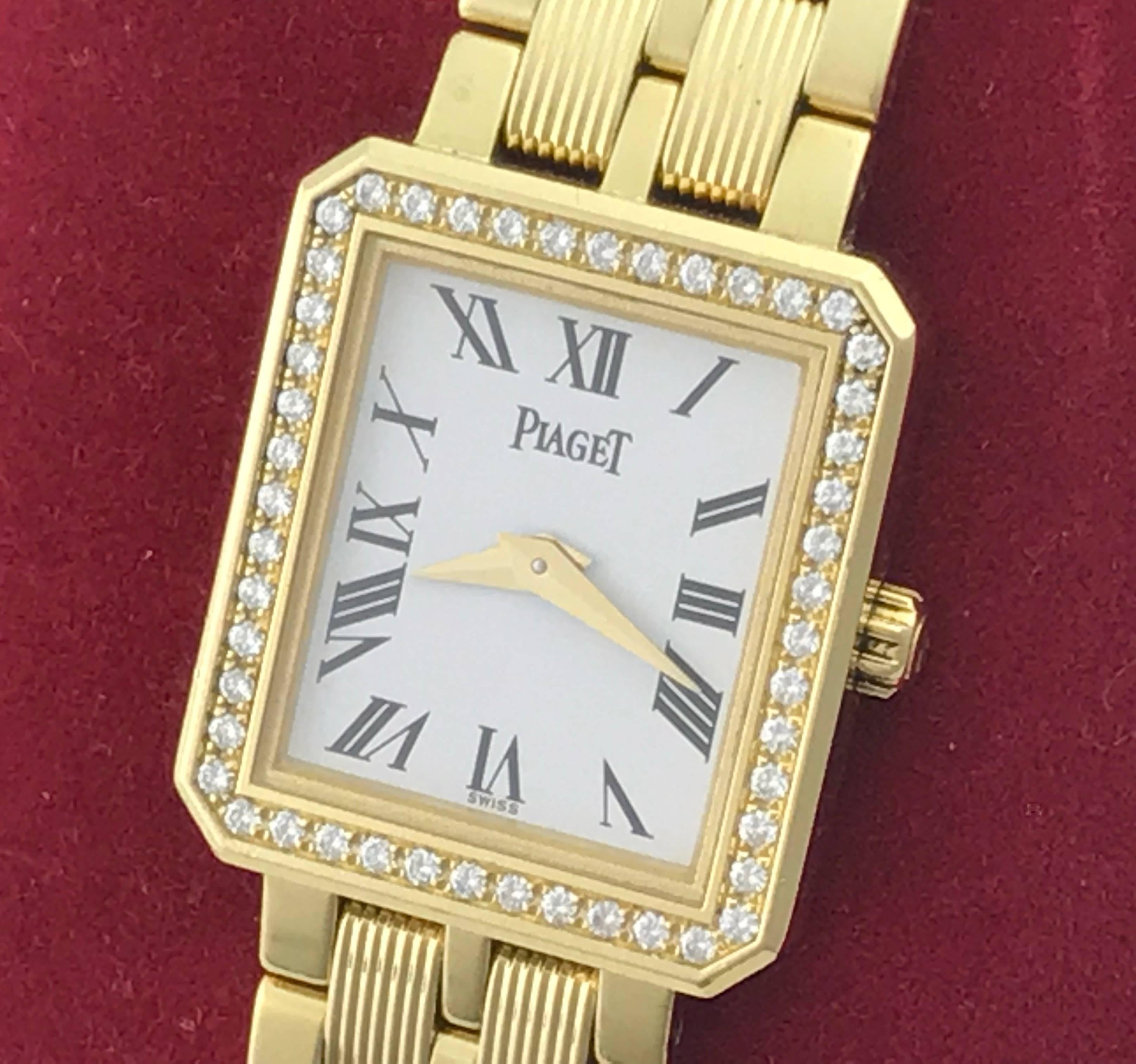 Piaget ladies 18k yellow gold and diamond quartz wrist watch. Model 5355M601D. 18k Yellow Gold rectangular style case with Piaget Diamond bezel (19x22mm), 18k Yellow Gold Piaget bracelet with deployant clasp, Gold Dial. Certified Pre Owned and ready