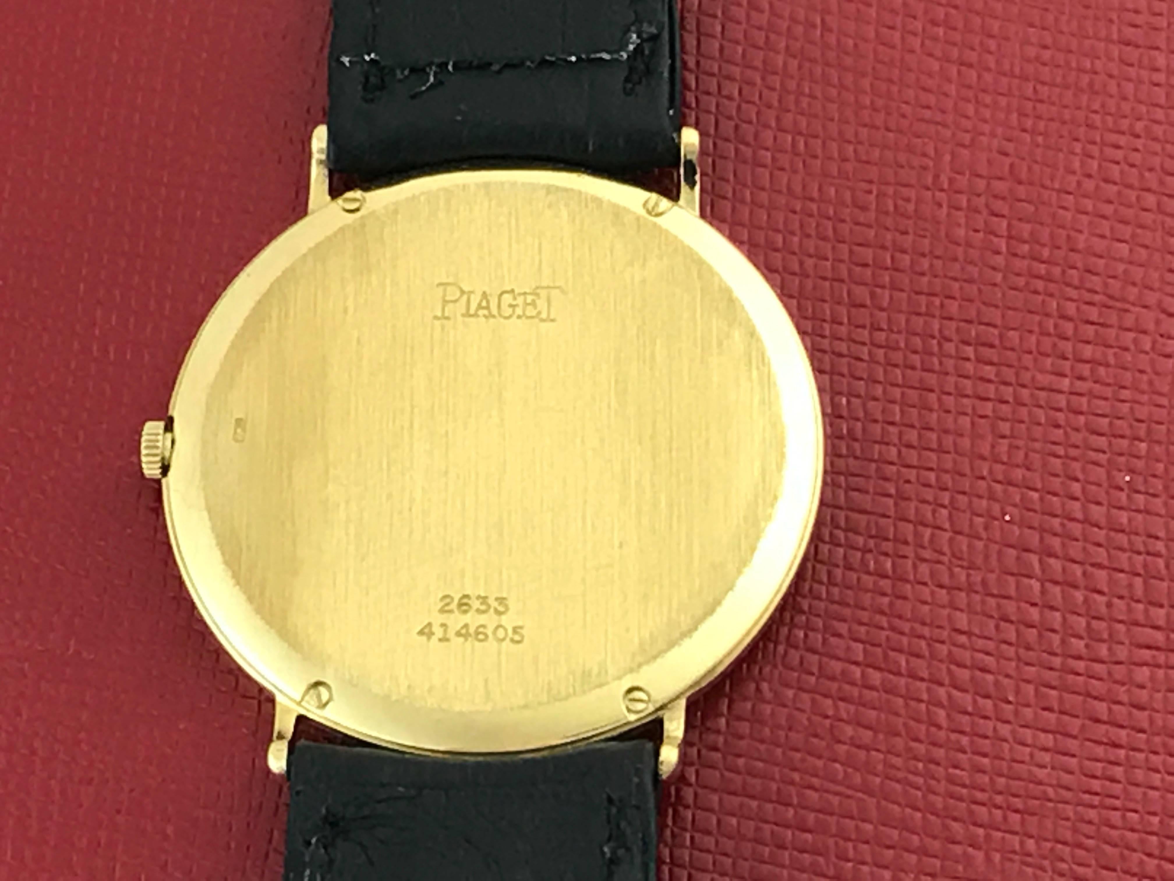 Contemporary Piaget 18k Yellow Gold Manual Wristwatch with Black Strap