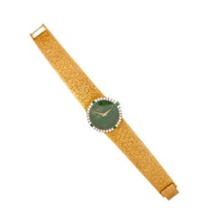 Piaget 18 Karat Yellow Gold Watch with Emeralds, Diamonds, and Jade Dial