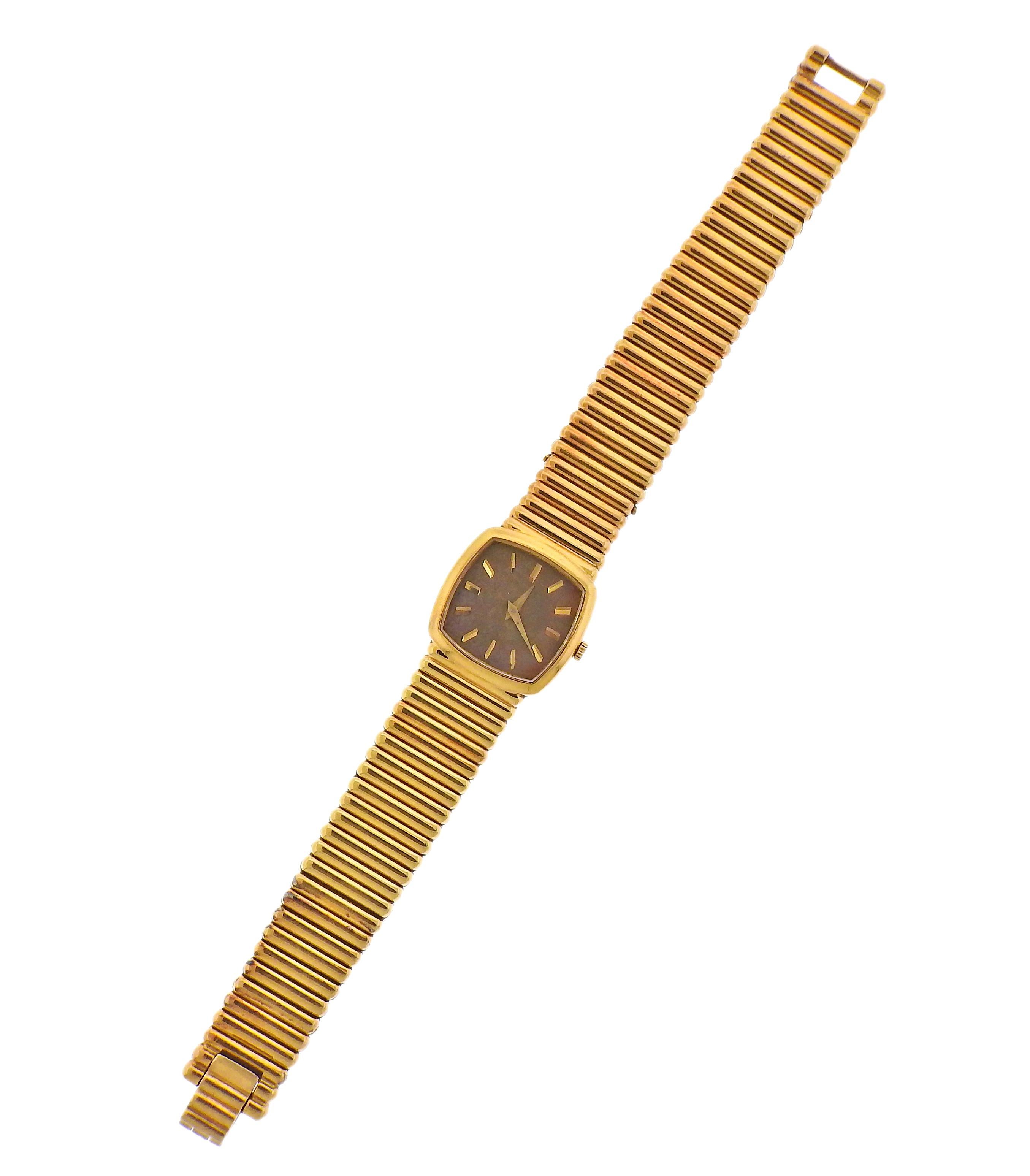 Vintage circa 1970s 18k gold watch bracelet by Piaget. Dial is discolored. Case - 23mm excl crown x 22mm. Bracelet is 7