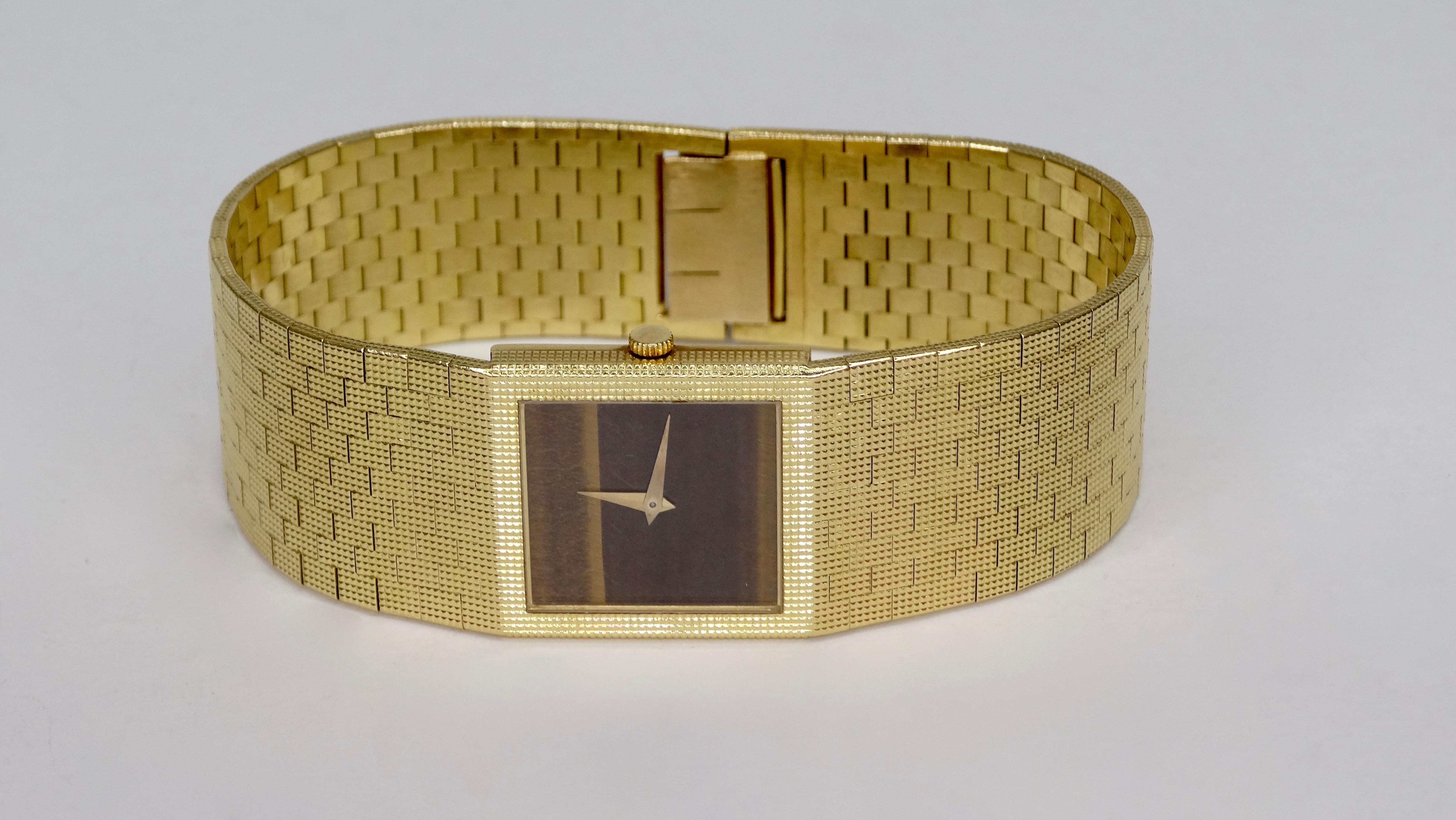 Gorgeous 1980s Swiss made Piaget watch solid 18k Yellow Gold. Features a sophisticated and flexible mesh gold bracelet, quartz movement, a Tigers Eye face. A classic time piece! 97.2g. 7.5 inches long, 1 inch wide. Style with all you favorites