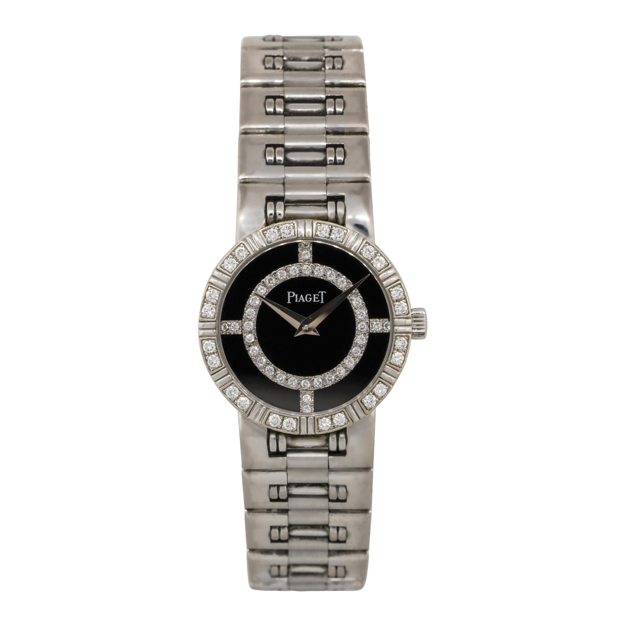 Brand: Piaget
Model: 90564
Case Material: 18k White Gold
Bezel: 18k White Gold bezel with Diamonds
Dial: Black Onyx Diamond dial with silver hands
Bracelet: 18k White gold link bracelet
Crystal: Sapphire Crystal
Size: Will fit up to a 6