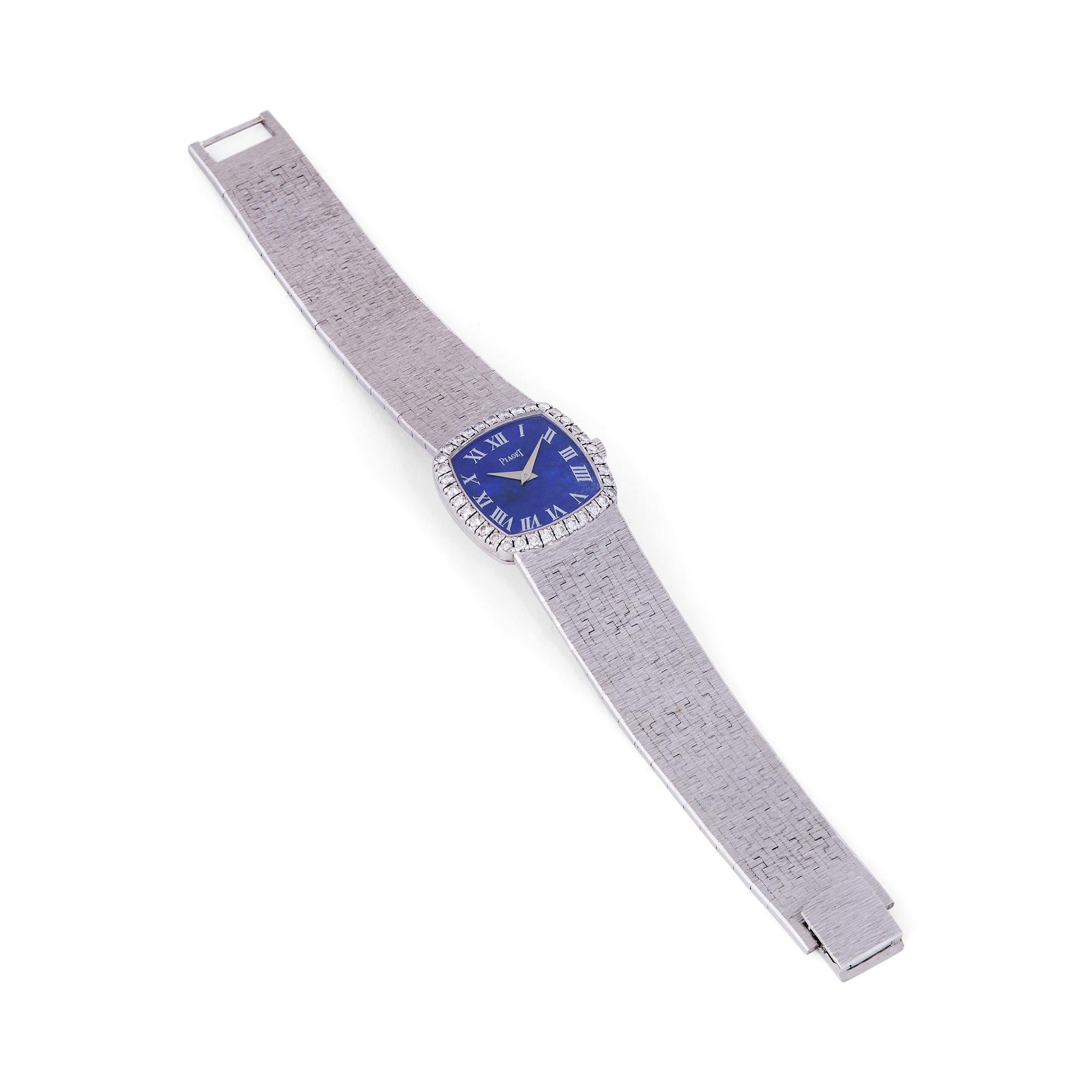 Authentic Piaget Black Tie watch crafted in 18 karat white gold. 23mm case with round brilliant cut diamonds, 18k white gold bracelet, lapis lazuli dial. Manual wind movement. Will fit up to a 6 inch wrist.  CIRCA 1960s

Brand: Piaget
Collection: