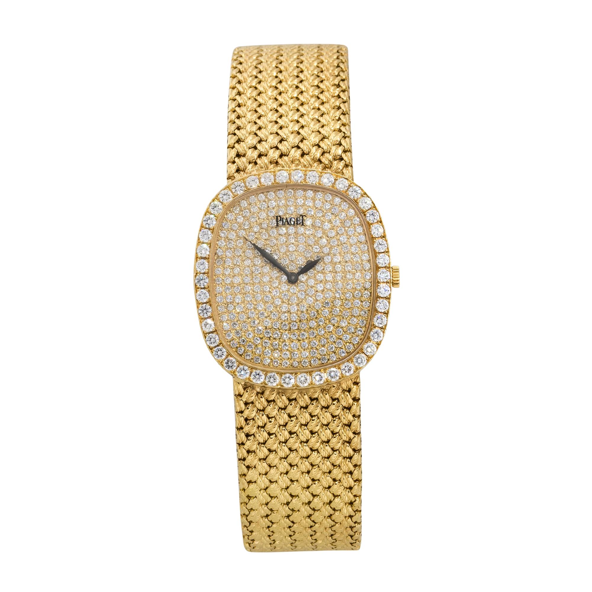Brand: Piaget
Case Material: 18k Yellow Gold
Case Diameter: 29mm
Crystal: Sapphire Crystal
Bezel: 18k Yellow gold bezel with Diamonds
Dial: All Diamond dial with Black hands
Bracelet: 18k Yellow Gold
Size: Will fit a 7.5