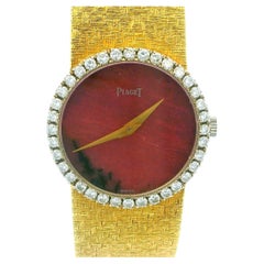 Piaget 9706B68 Rhodochrosite Dial Diamond Bezel Mesh Bracelet in 18K Yellow Gold