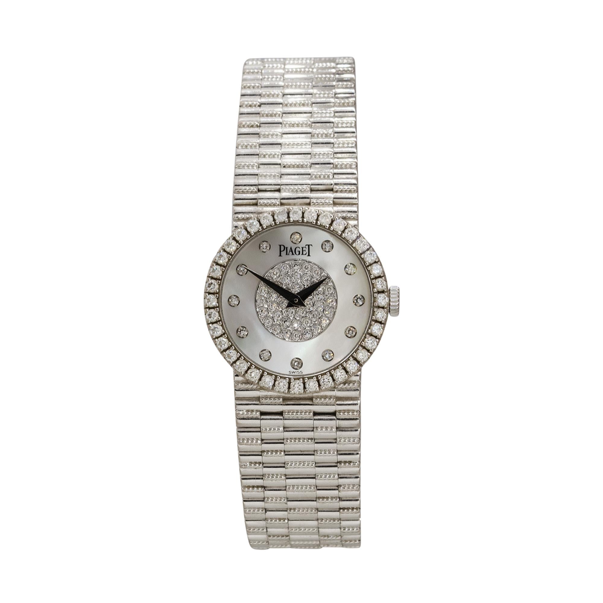 Brand: Piaget
Case Material: 18k White Gold
Case Diameter: 24.5mm
Crystal: Sapphire Crystal
Bezel: 18k White Gold bezel with Diamonds
Dial: Mother of Pearl dial with silver hands, Diamond hour markers and Diamond cluster at the center
Bracelet: 18k